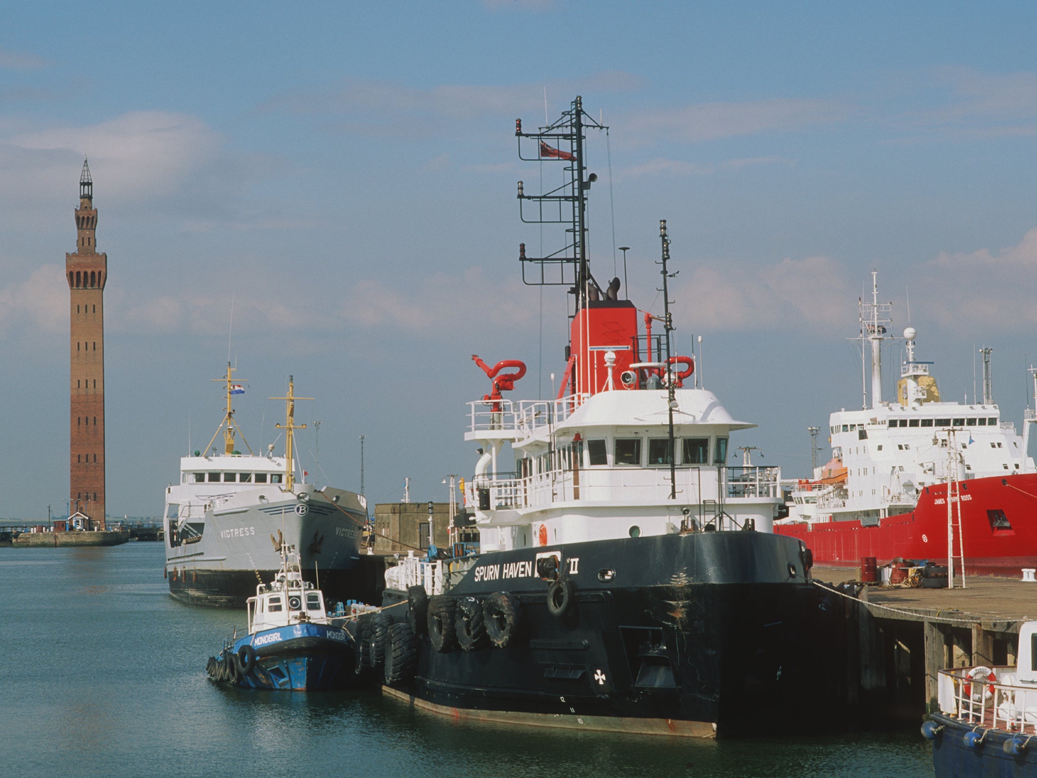 Boats in Grimsby docks with the dock tower behind, circa 1985