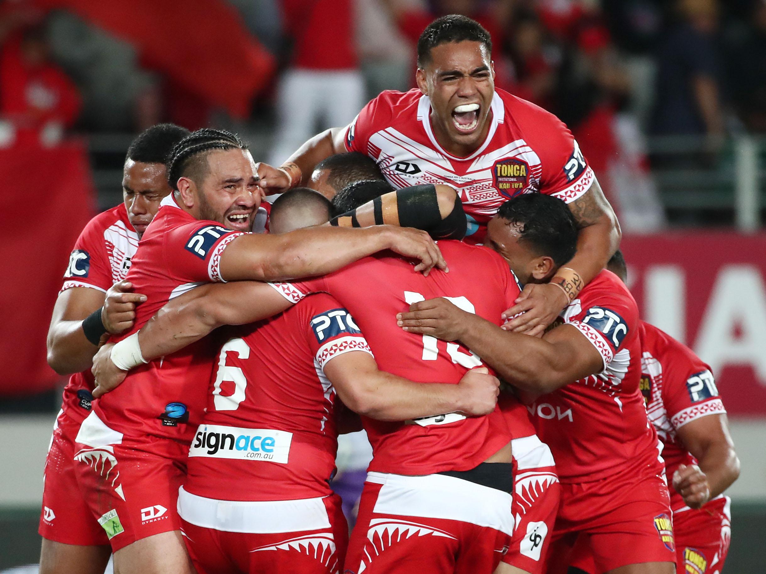 Tongan players burst into tears after securing a shock victory of Australia