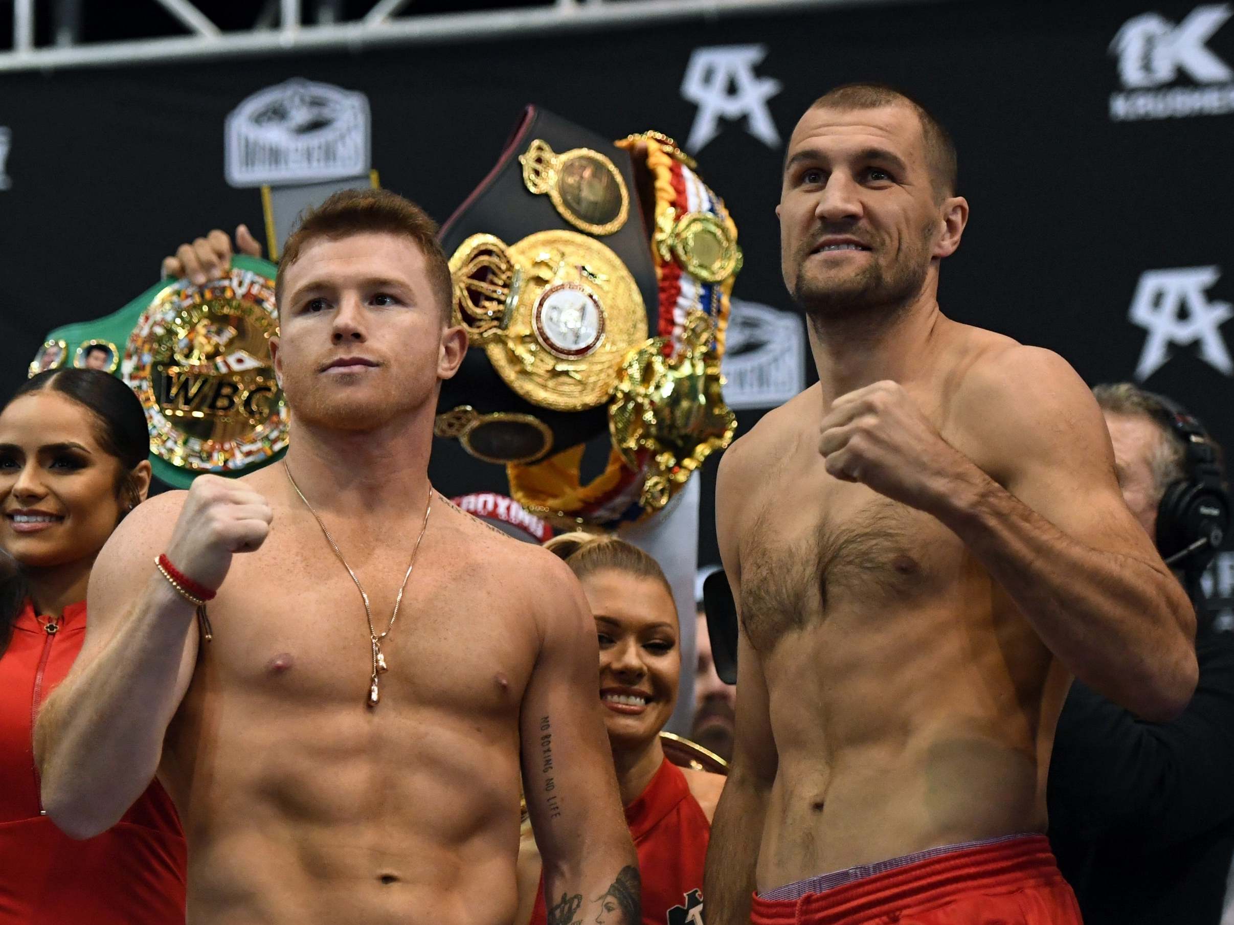 Canelo and Kovalev pose after the weigh-in