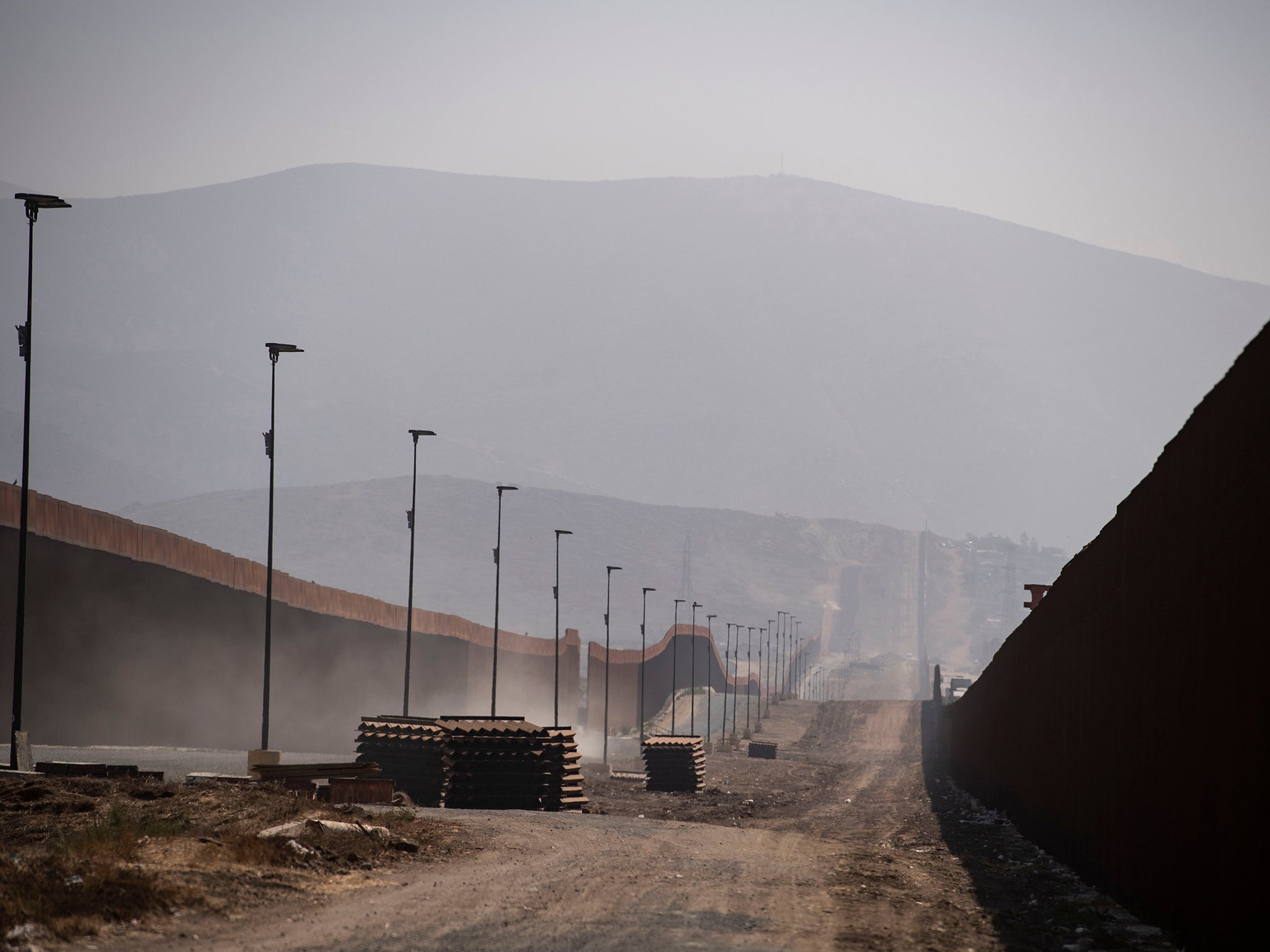 Breaches have occurred along a stretch of the wall by San Diego