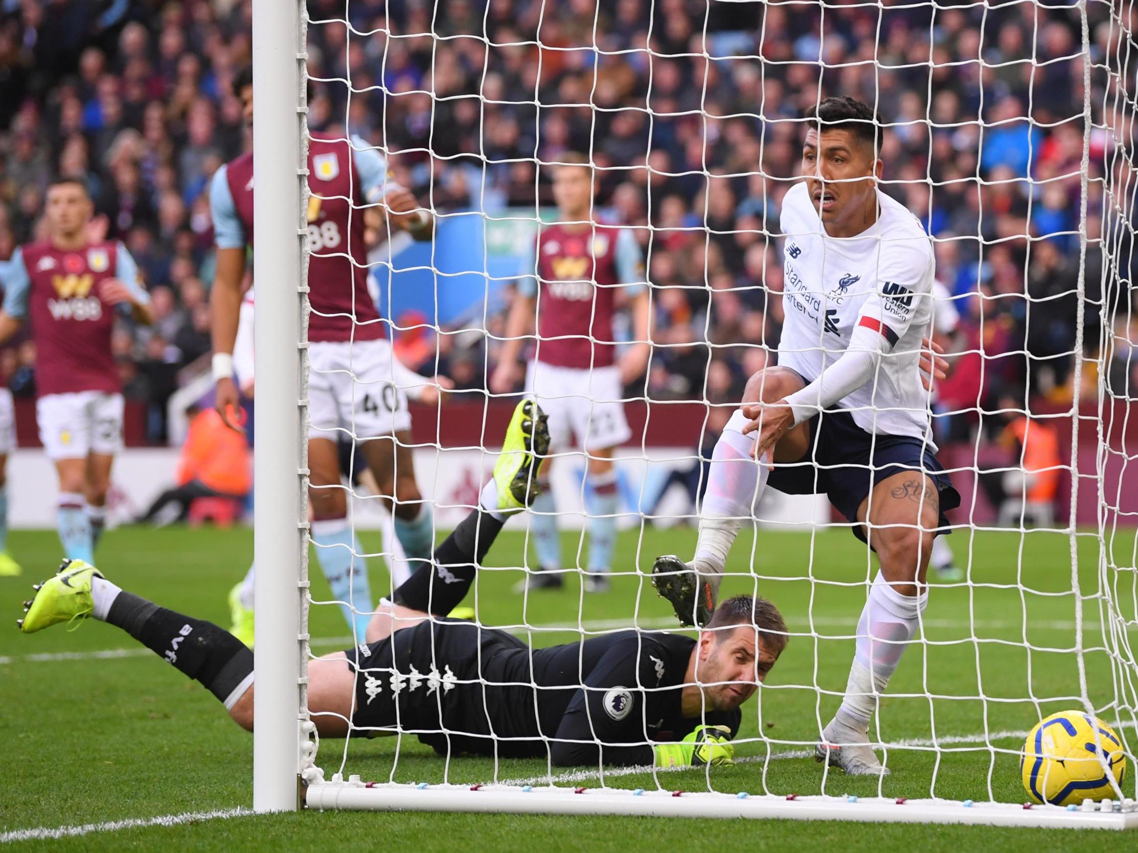 Liverpool forward Roberto Firmino scores a disallowed goal