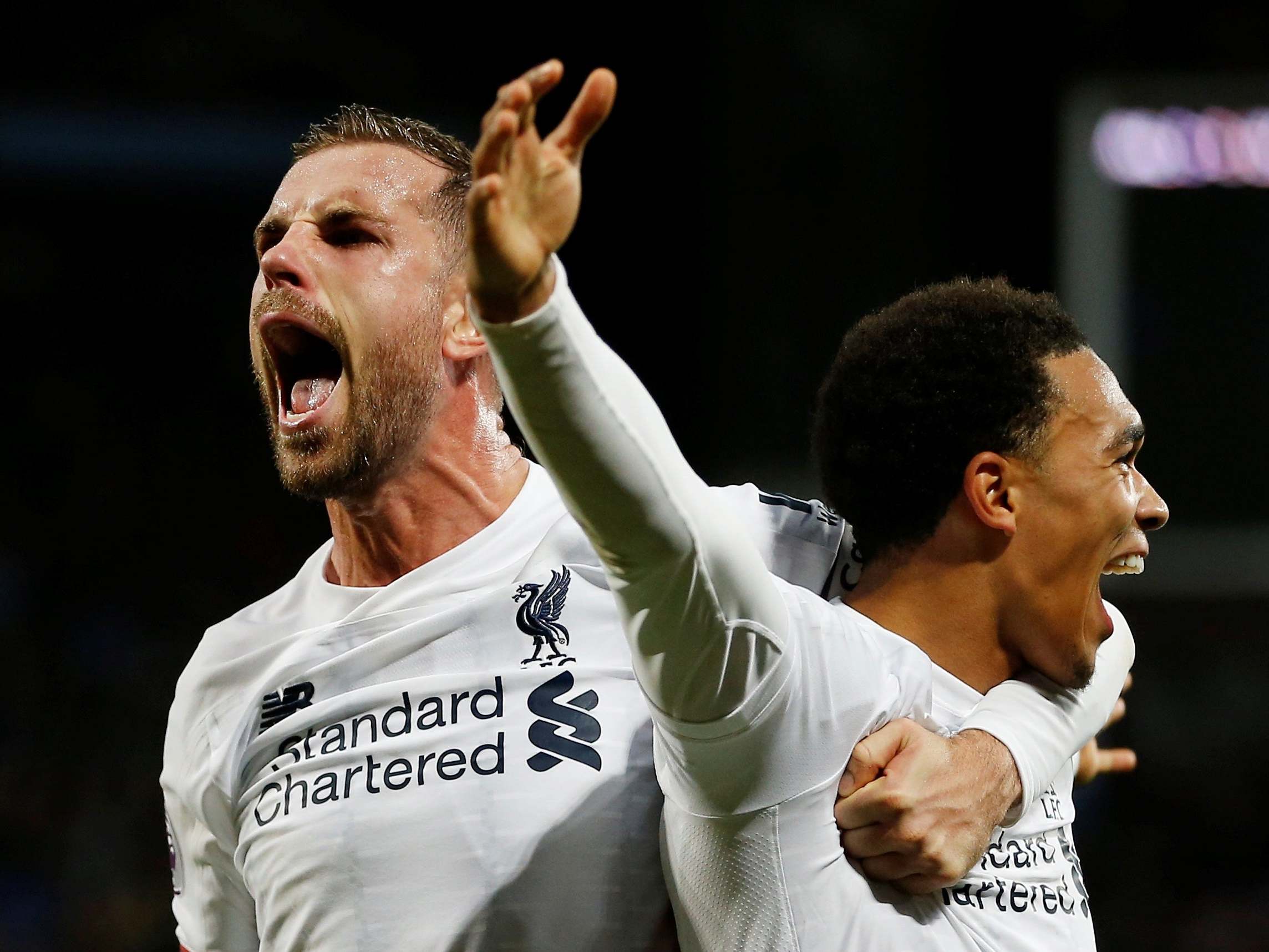 Jordan Henderson and Trend Alexander-Arnold celebrate