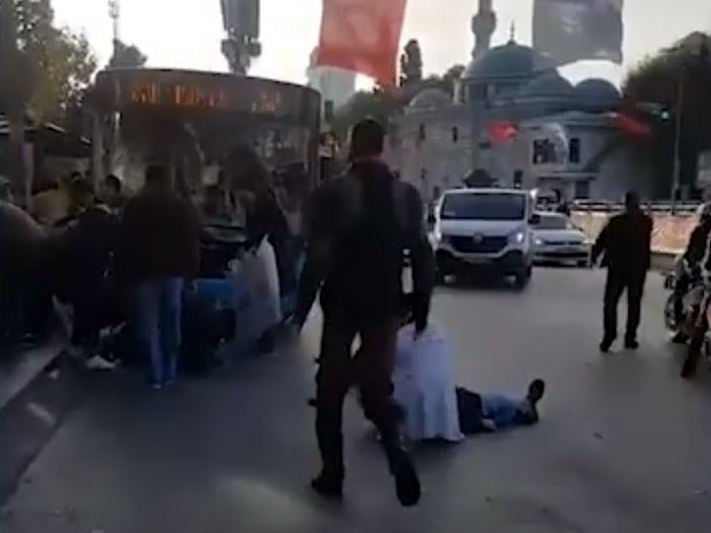 Driver rams bus into crowd, stabs people and jumps into sea