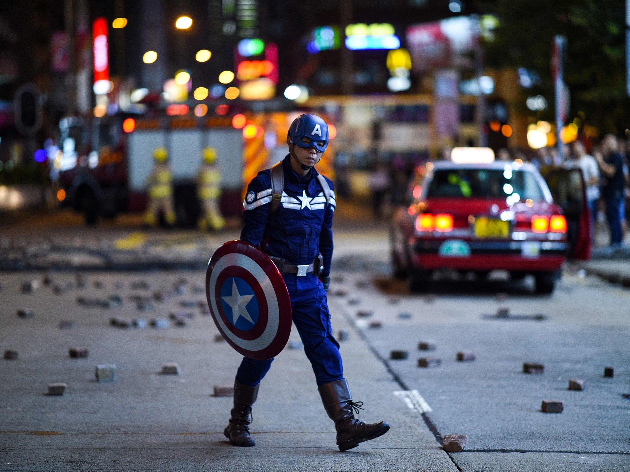 Protesters have continued to wear costumes despite the government's ban on face masks