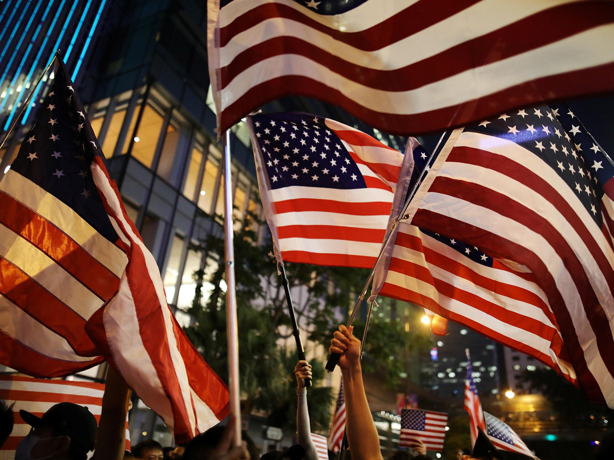 Demonstrators are waving US during marches in a cry for help