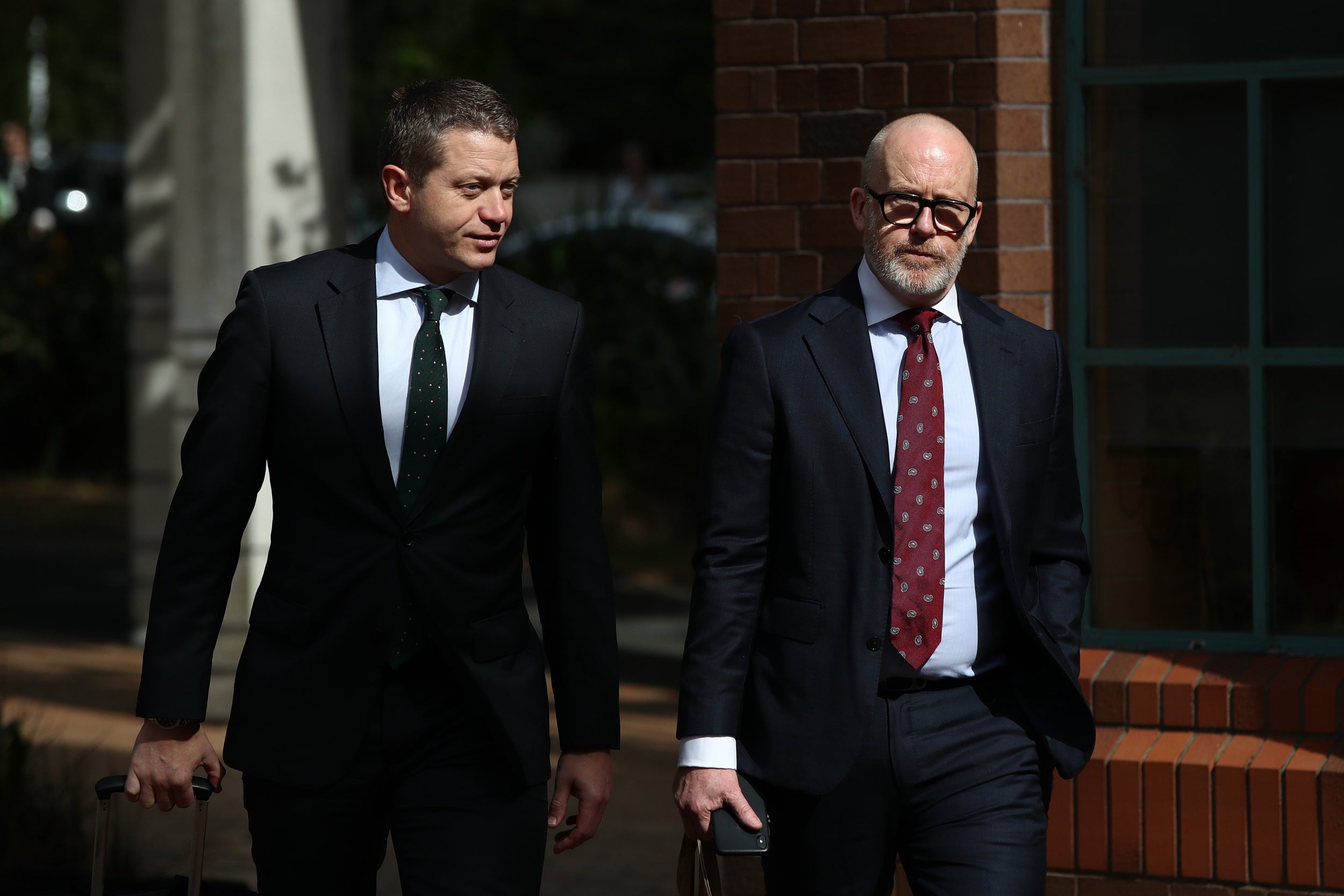 Ron Mansfield, right, is representing Dotcom