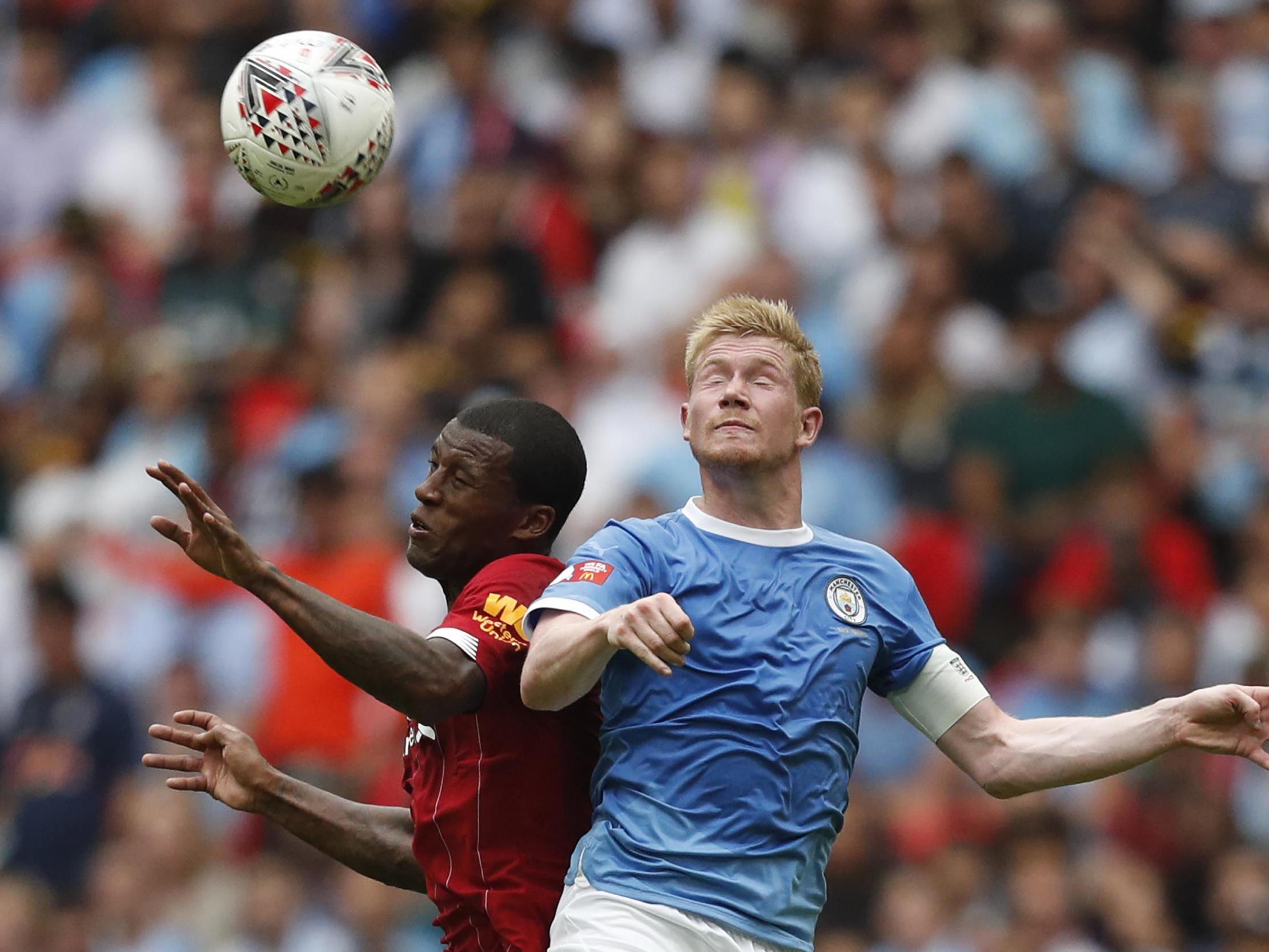 Liverpool’s Gini Wijnaldum and Manchester City’s Kevin De Bruyne