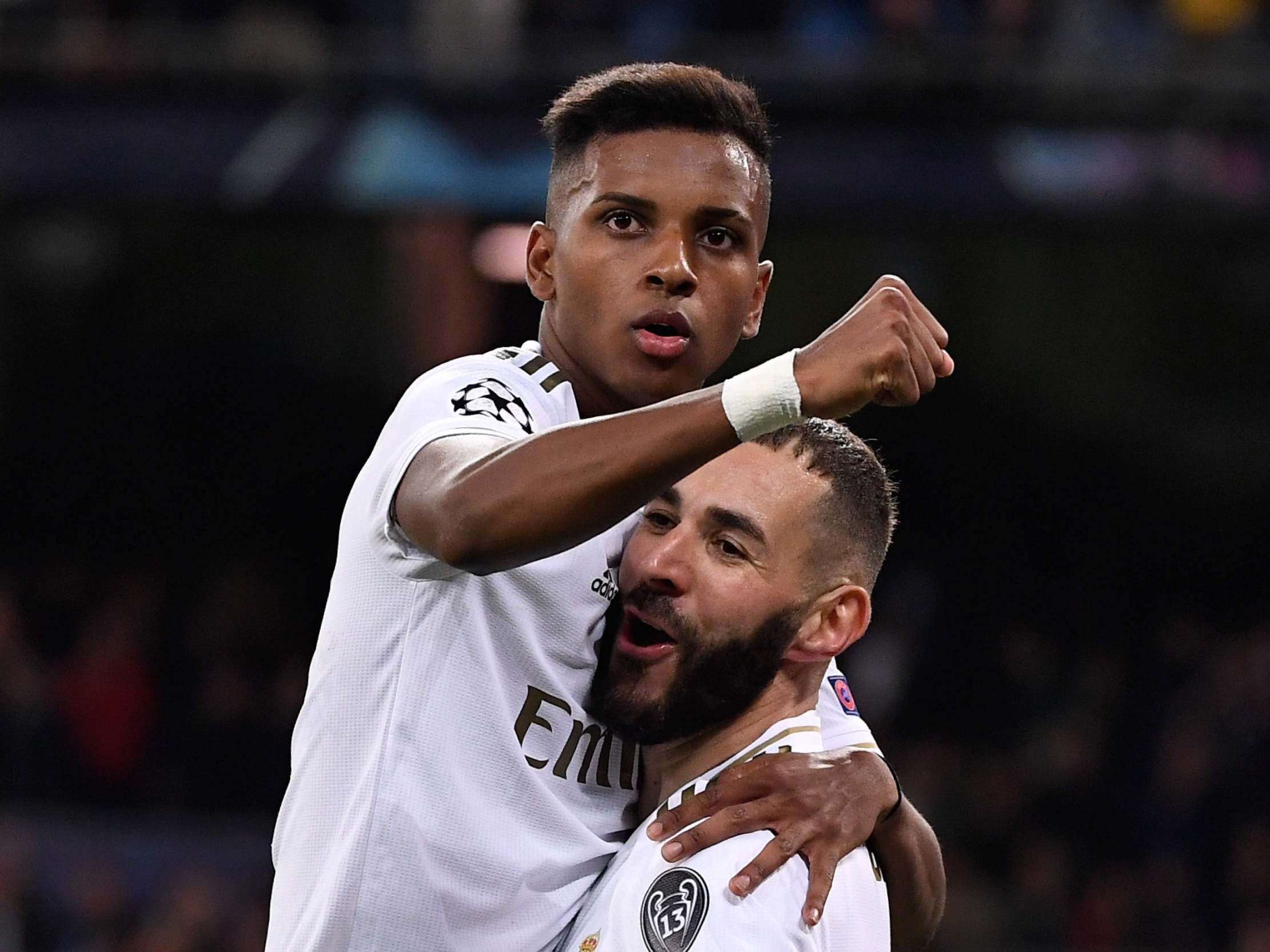 Real Madrid's Karim Benzema celebrates with Rodrygo