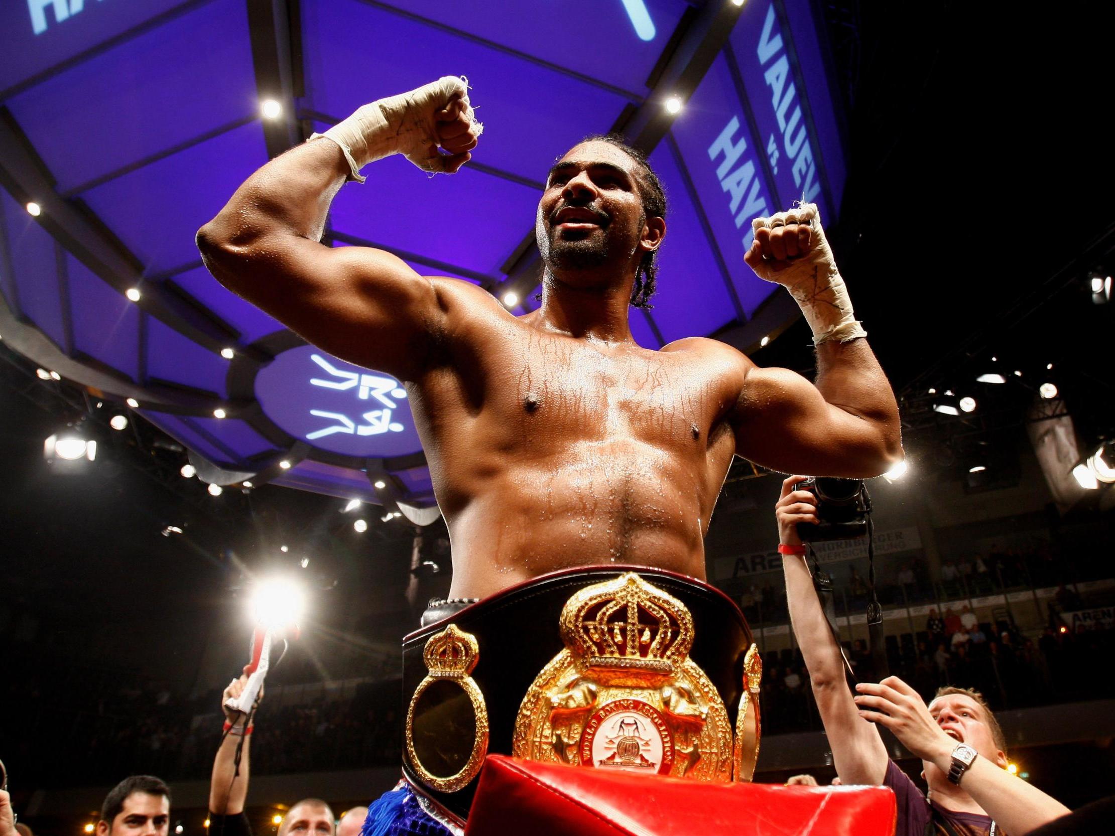 David Haye celebrates after defeating Nikolai Valuev