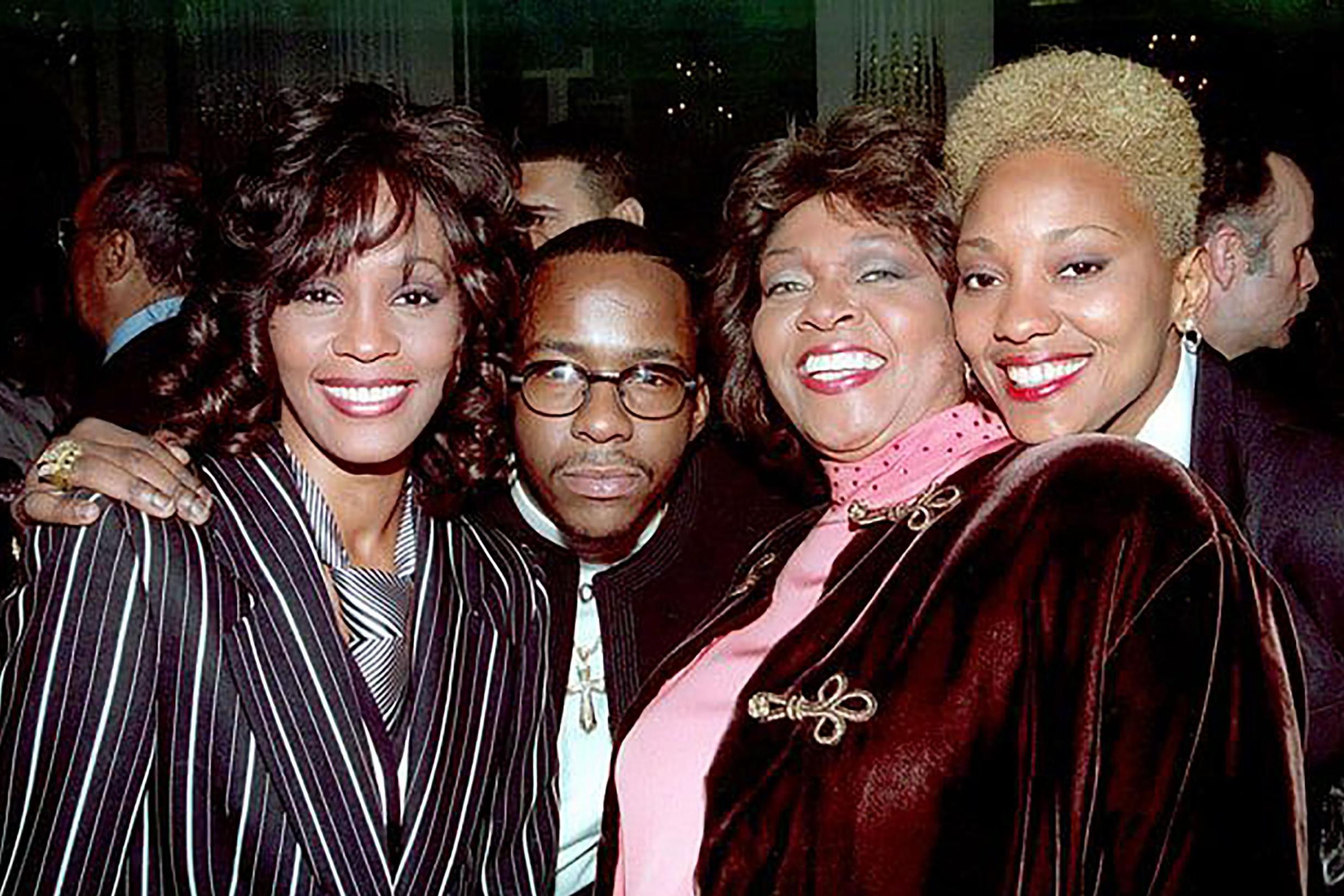 Whitney Houston with Bobby Brown and Robyn Crawford