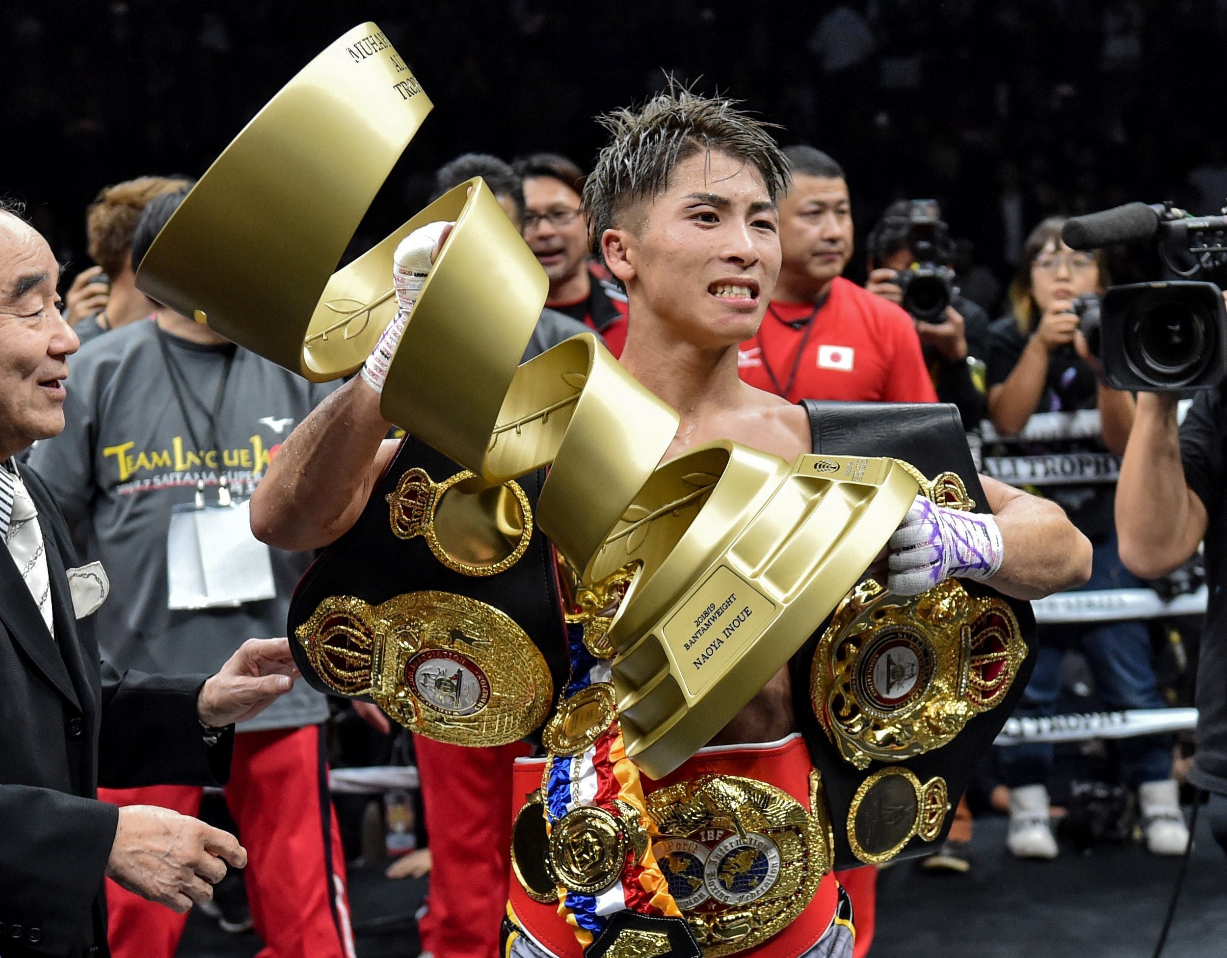 Inoue lifts the Muhammad Ali trophy