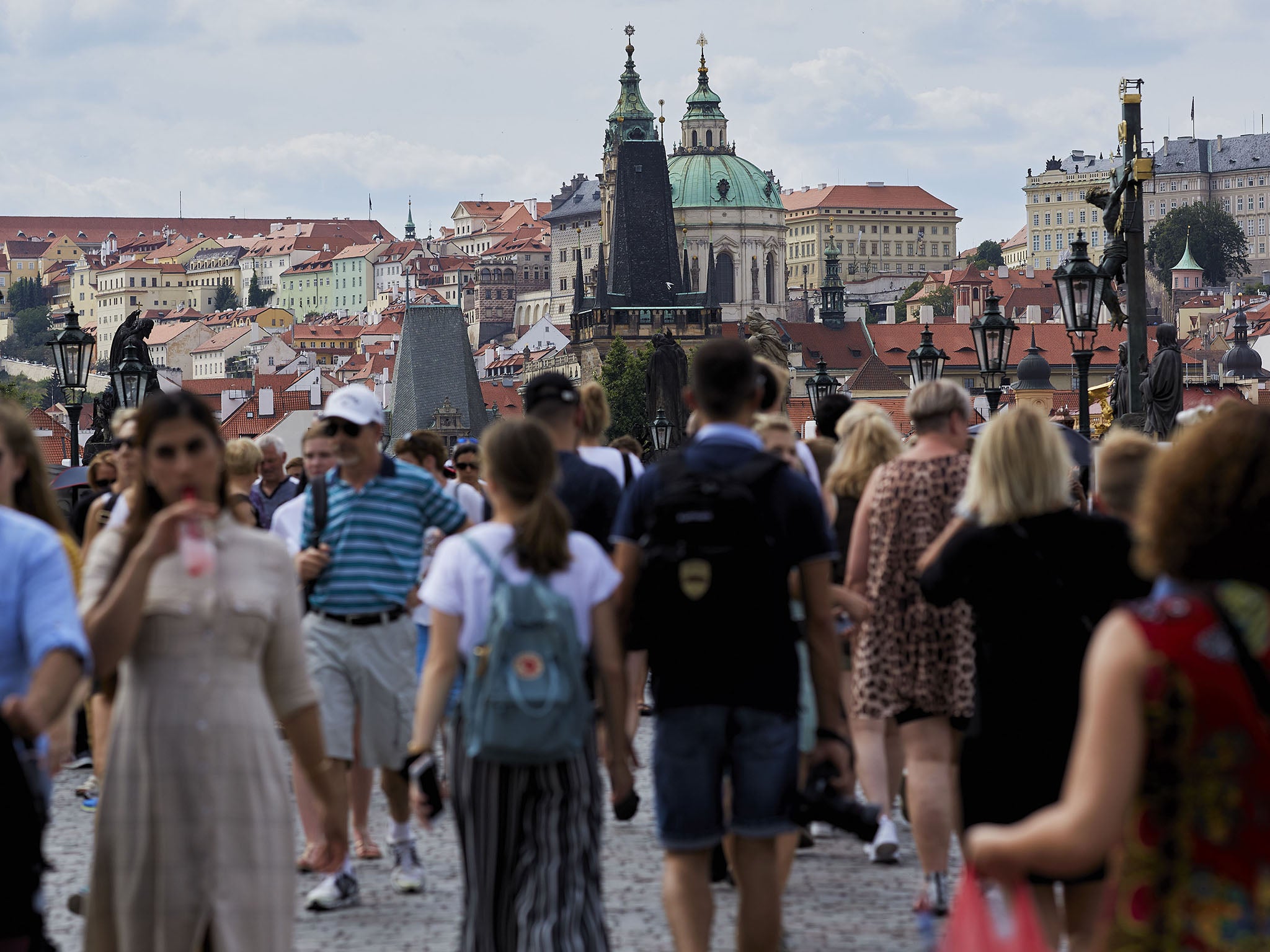 Locals avoid the centre of Prague, which is now flooded with tourists all year round