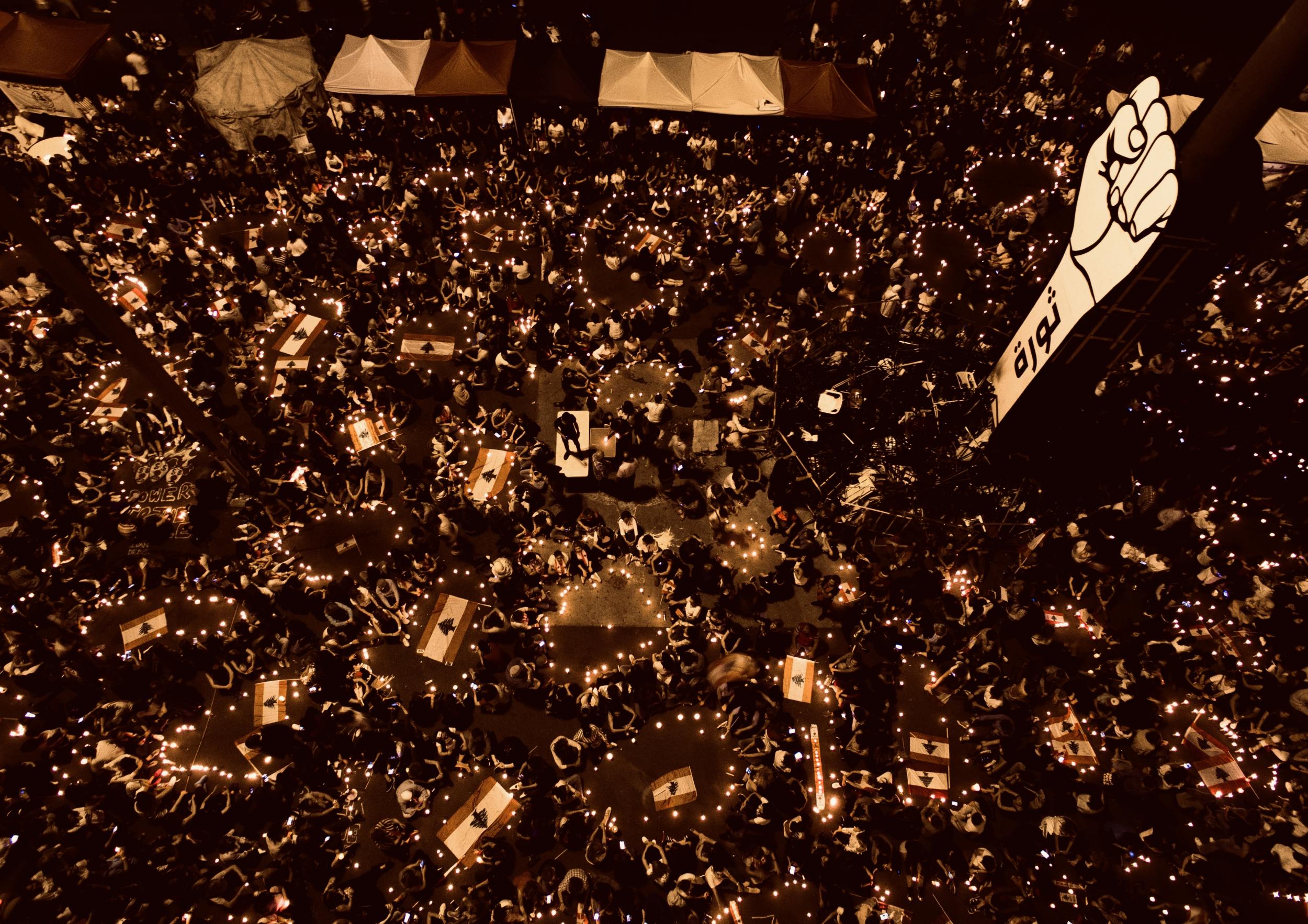 Thousands of women gather for a candlelit vigil in Martyrs’ Square, Beirut, on Wednesday