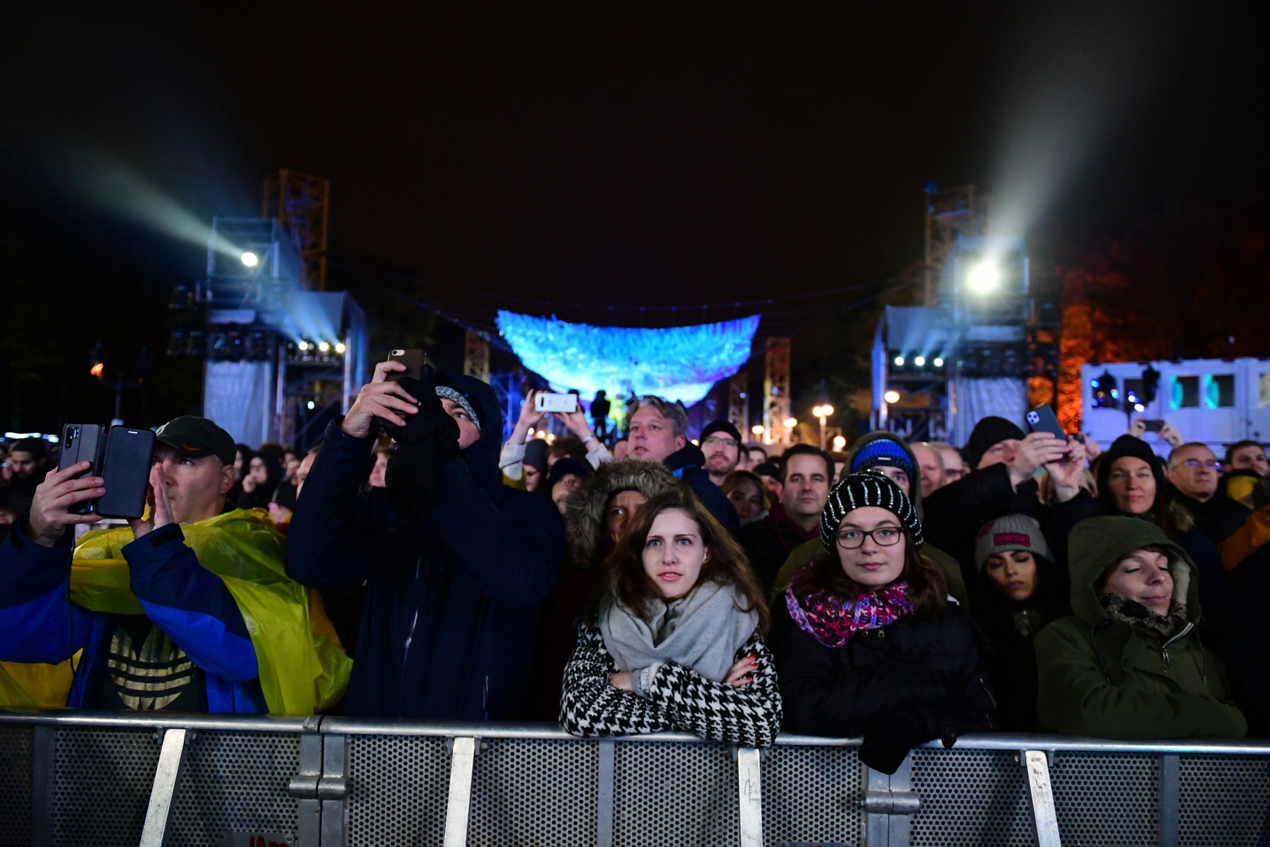 Visitors attend the celebrations at the Brandenburg Gate