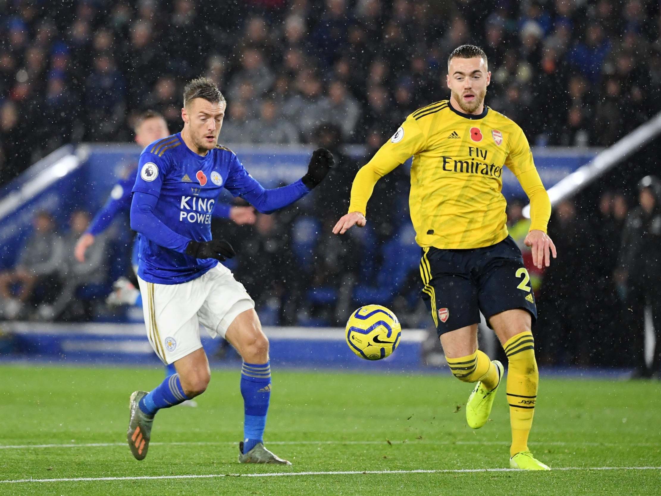 Calum Chambers of Arsenal and Jamie Vardy of Leicester City