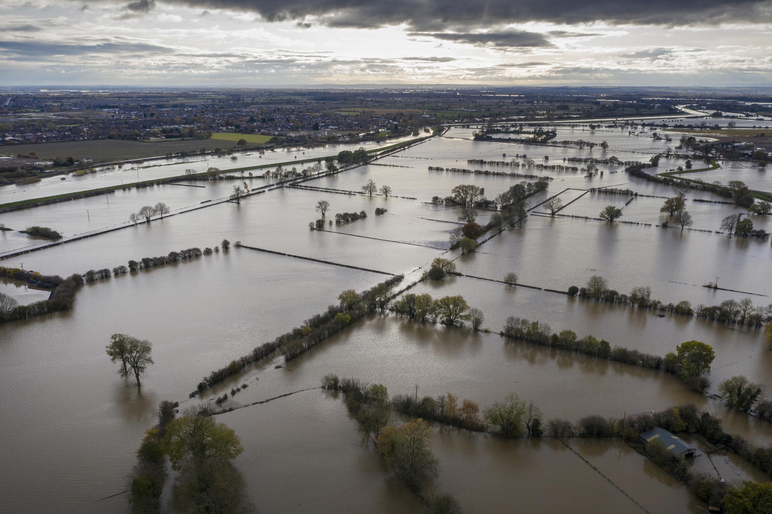 Floodwater covers roads and local houses in Fishlake (Getty)