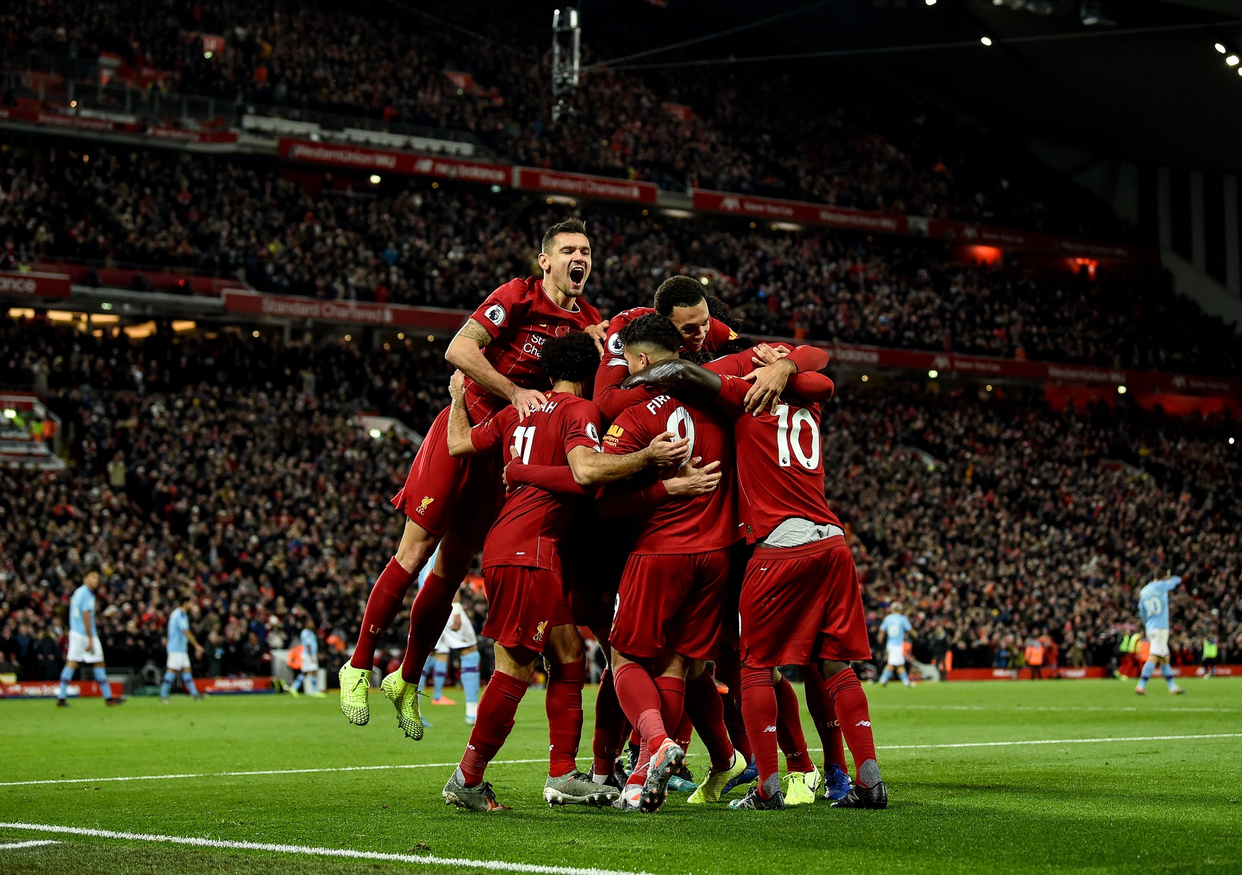 Liverpool celebrate during their 3-1 victory over Man City (Getty)