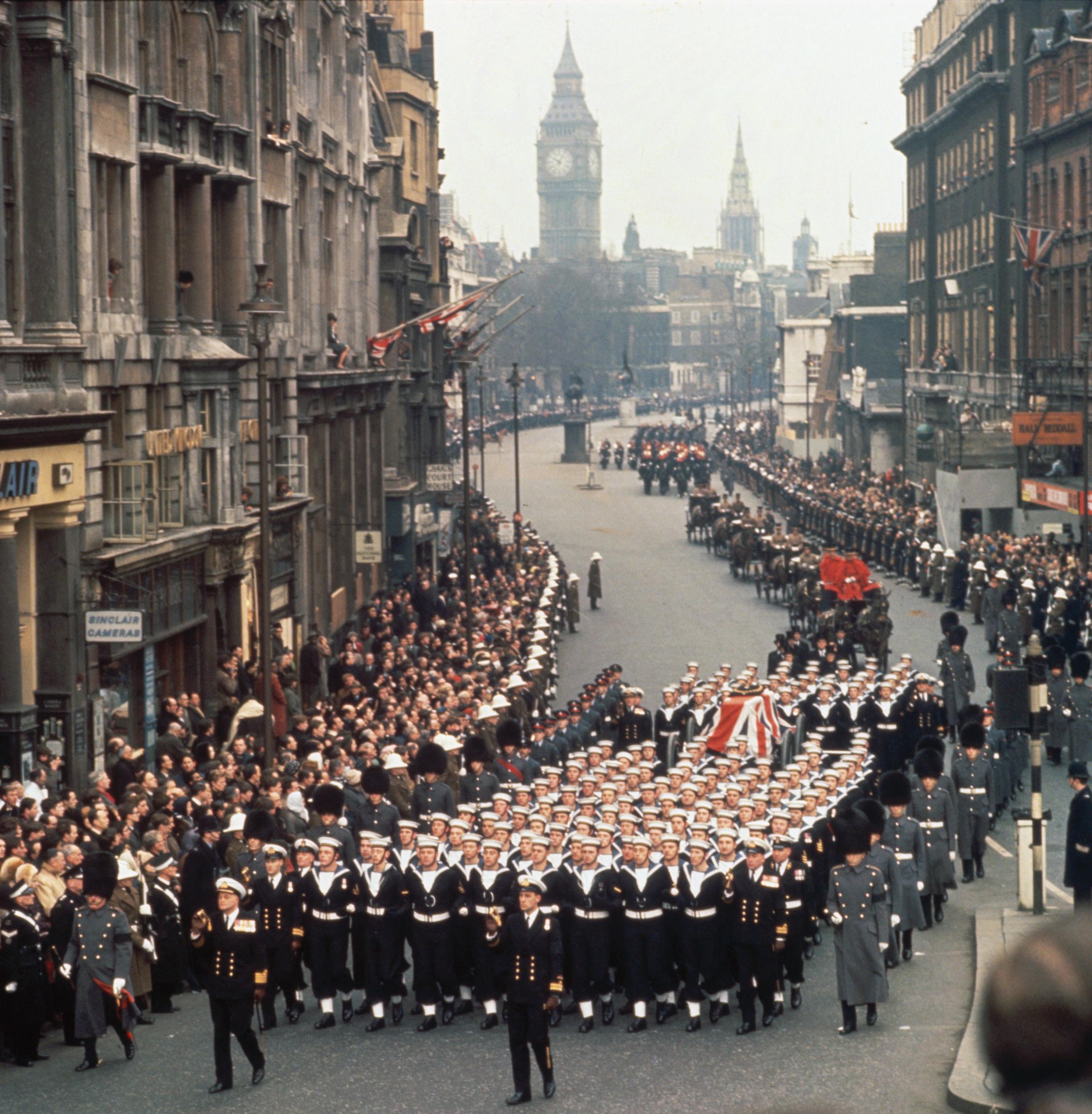 The cortege at the state funeral of Sir Winston Churchill makes its way down Whitehall, London, 30 January 1965