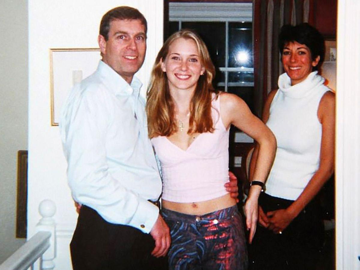 Teenage Virginia Giuffre pictured with Prince Andrew and Ghislaine Maxwell