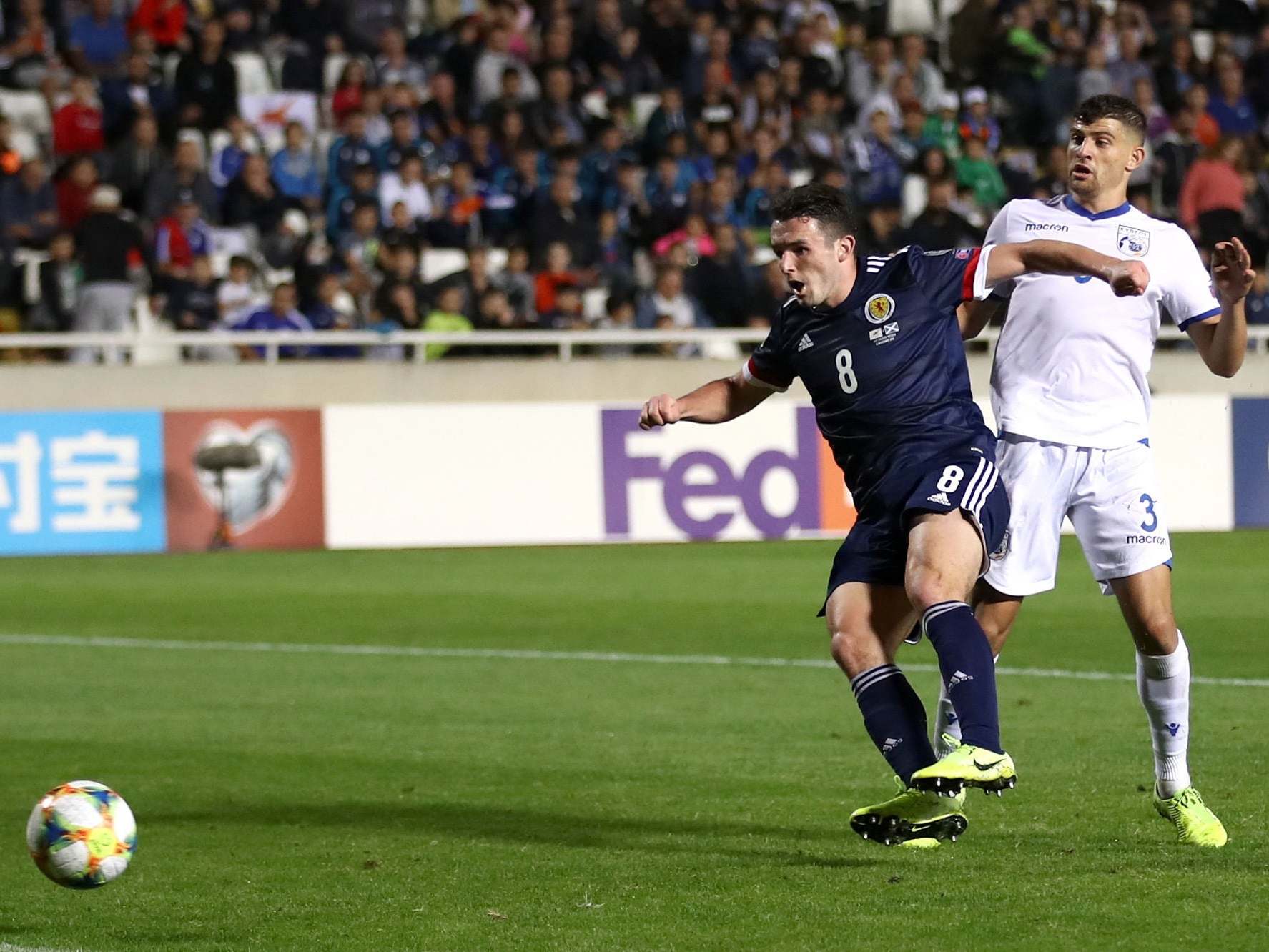 John McGinn steers in Scotland's second goal