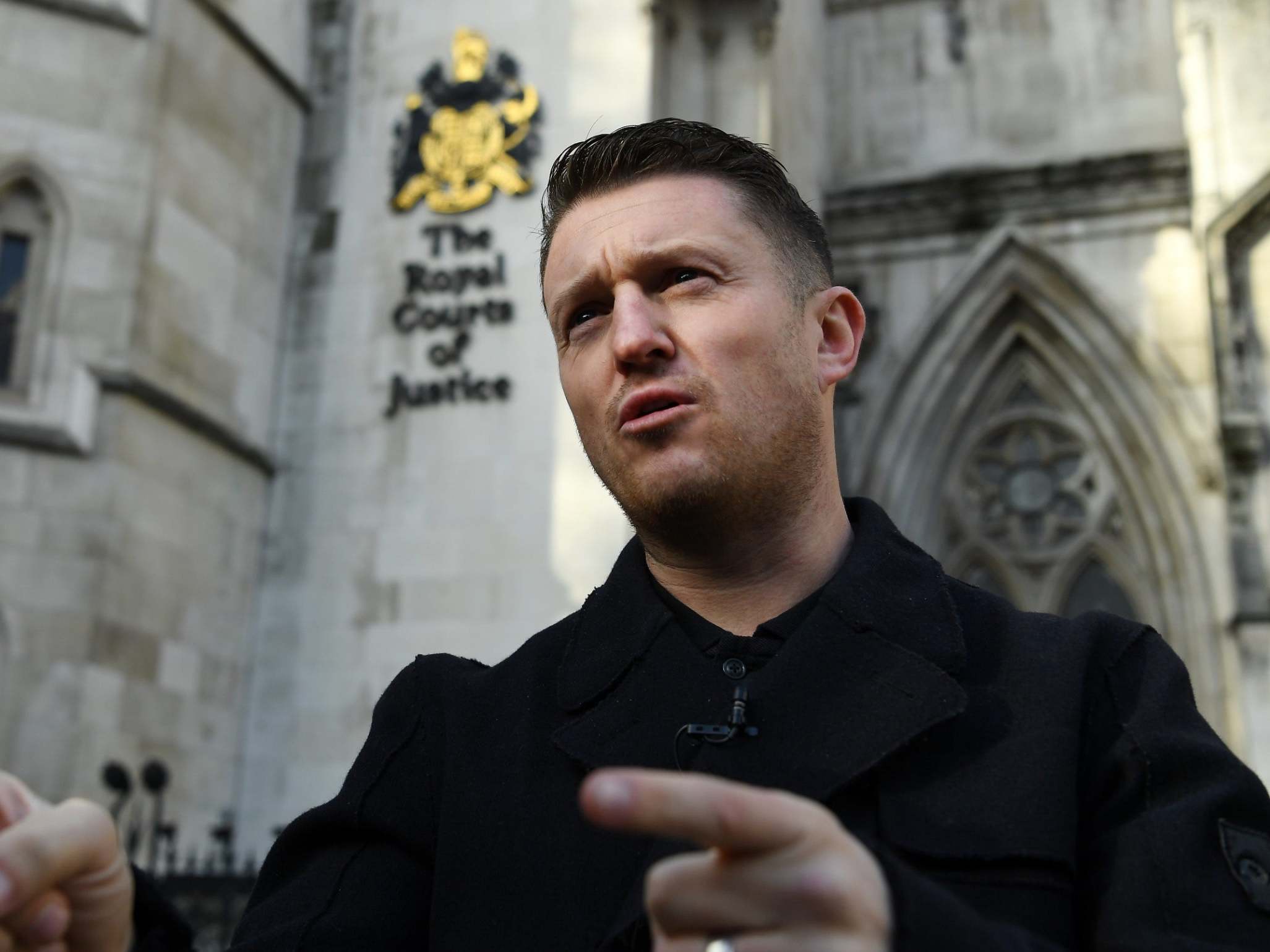 Tommy Robinson outside the High Court in London