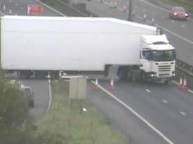 An articulated lorry appeared to drive through traffic cones and back towards Avonmouth to escape the traffic