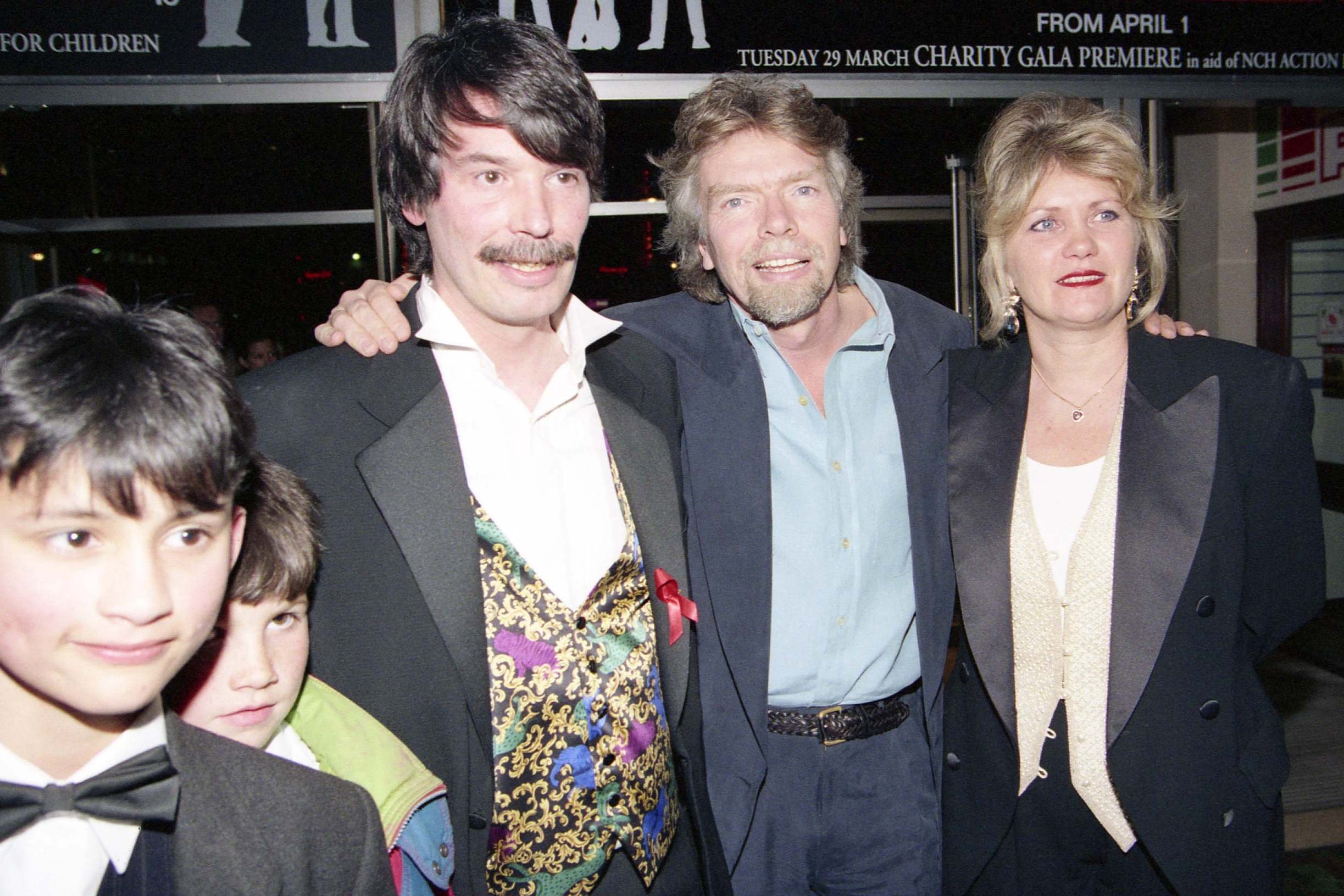 Powell with his children and Richard and Joan Branson at the UK premiere of 'Backbeat' in London, 1994