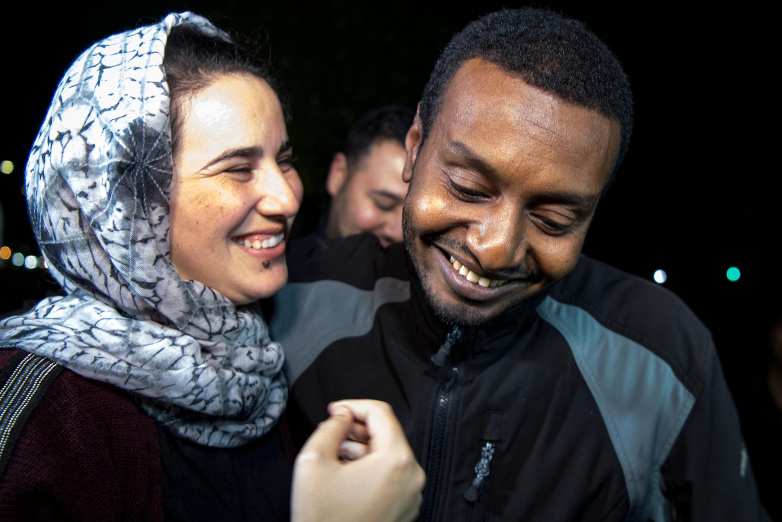 Hajar Raissouni is greeted by her boyfriend Rifaat Al-Amin upon leaving prison