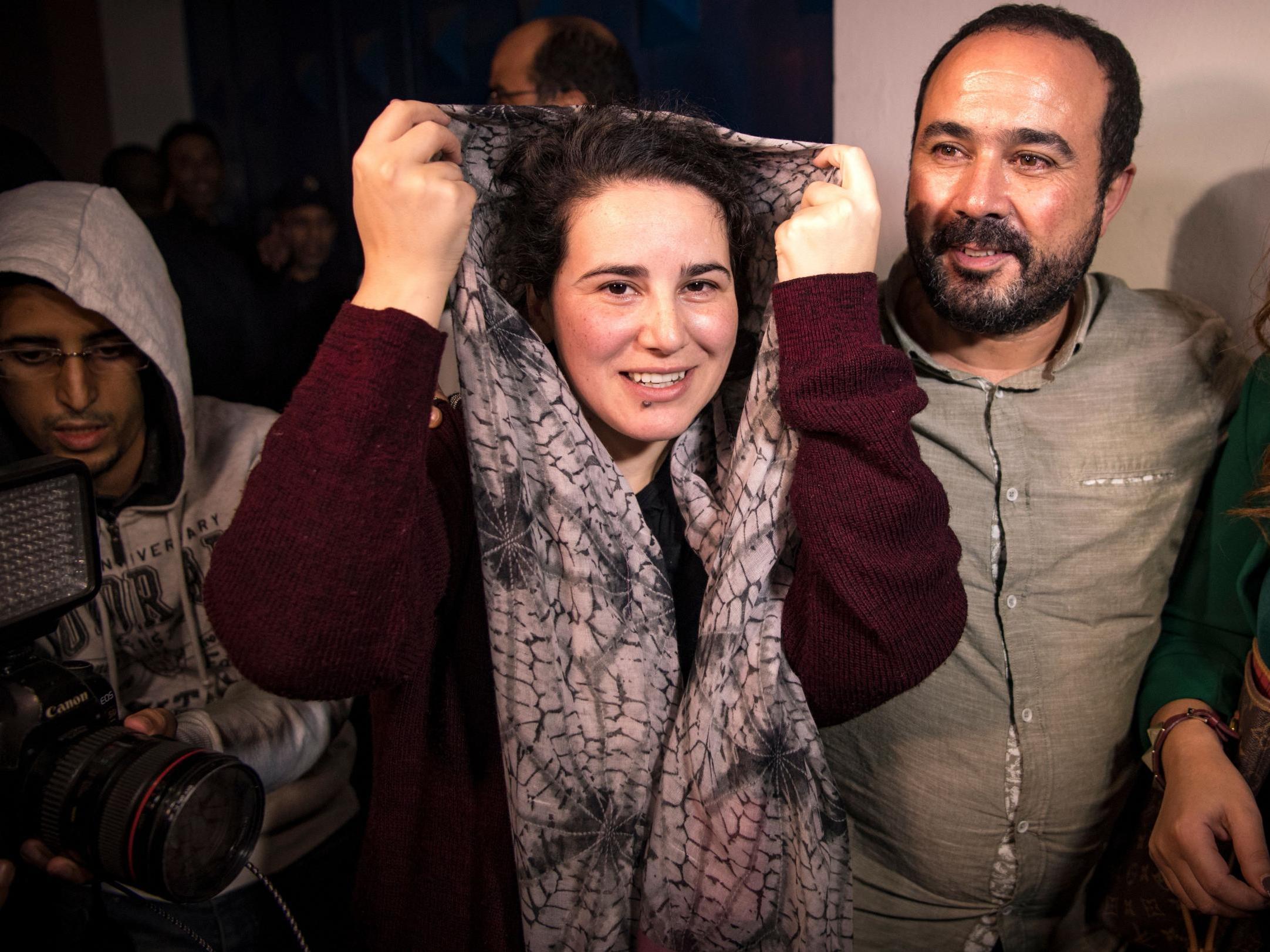 Moroccan journalist Hajar Raissouni (left) leaves prison following her royal pardon in October