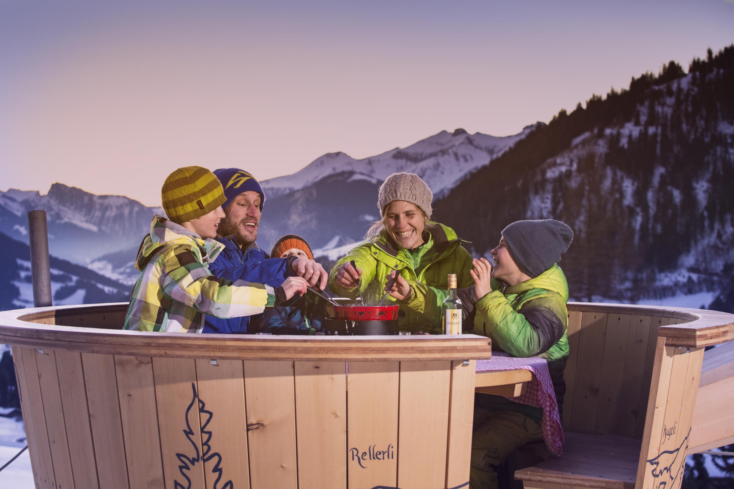 Eating molten cheese in the dairy's giant fondue pot