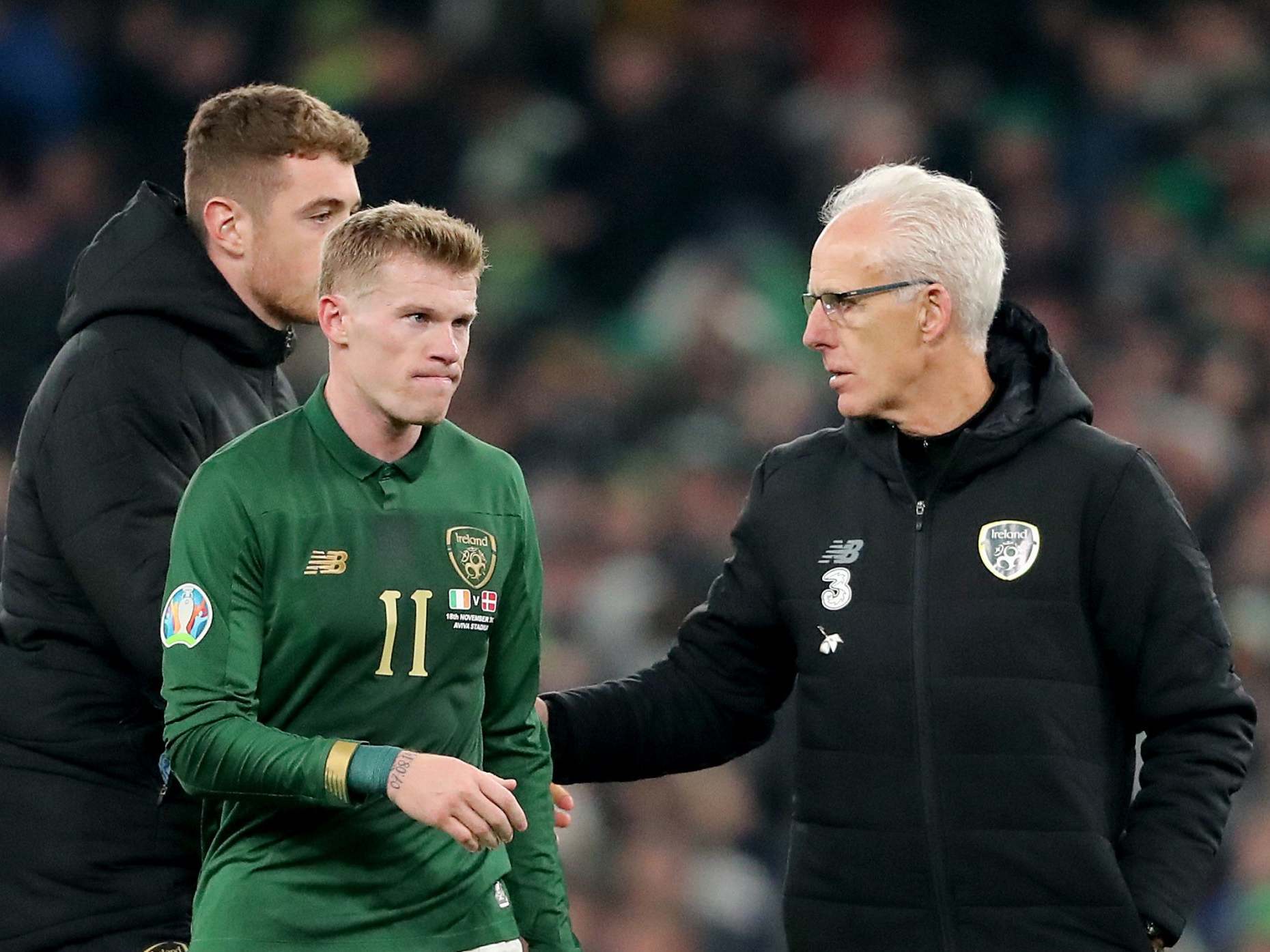 Mick McCarthy consoles James McClean