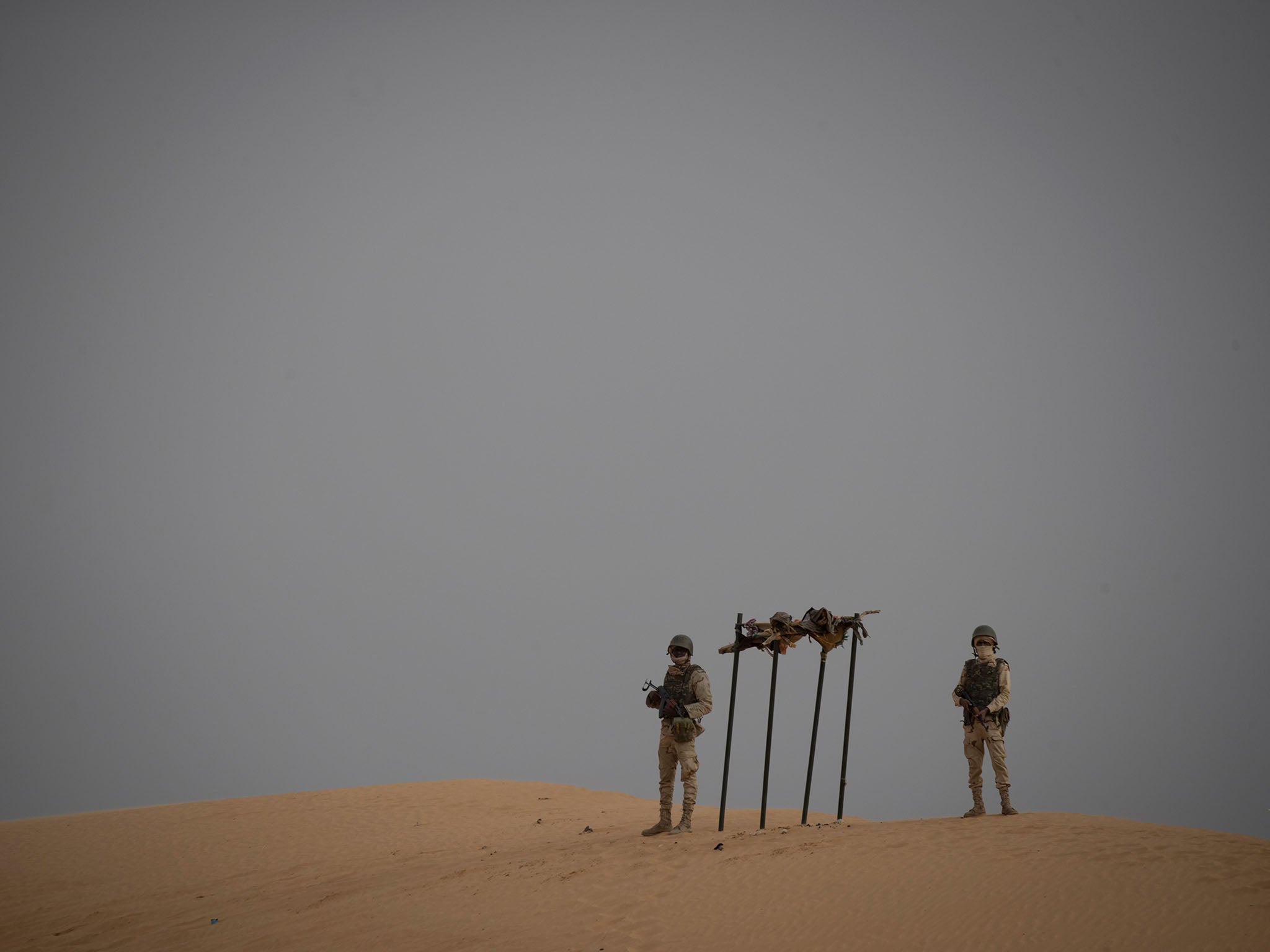 Sahel soldiers stand near the border of Mali to defend remote villages against jihadists