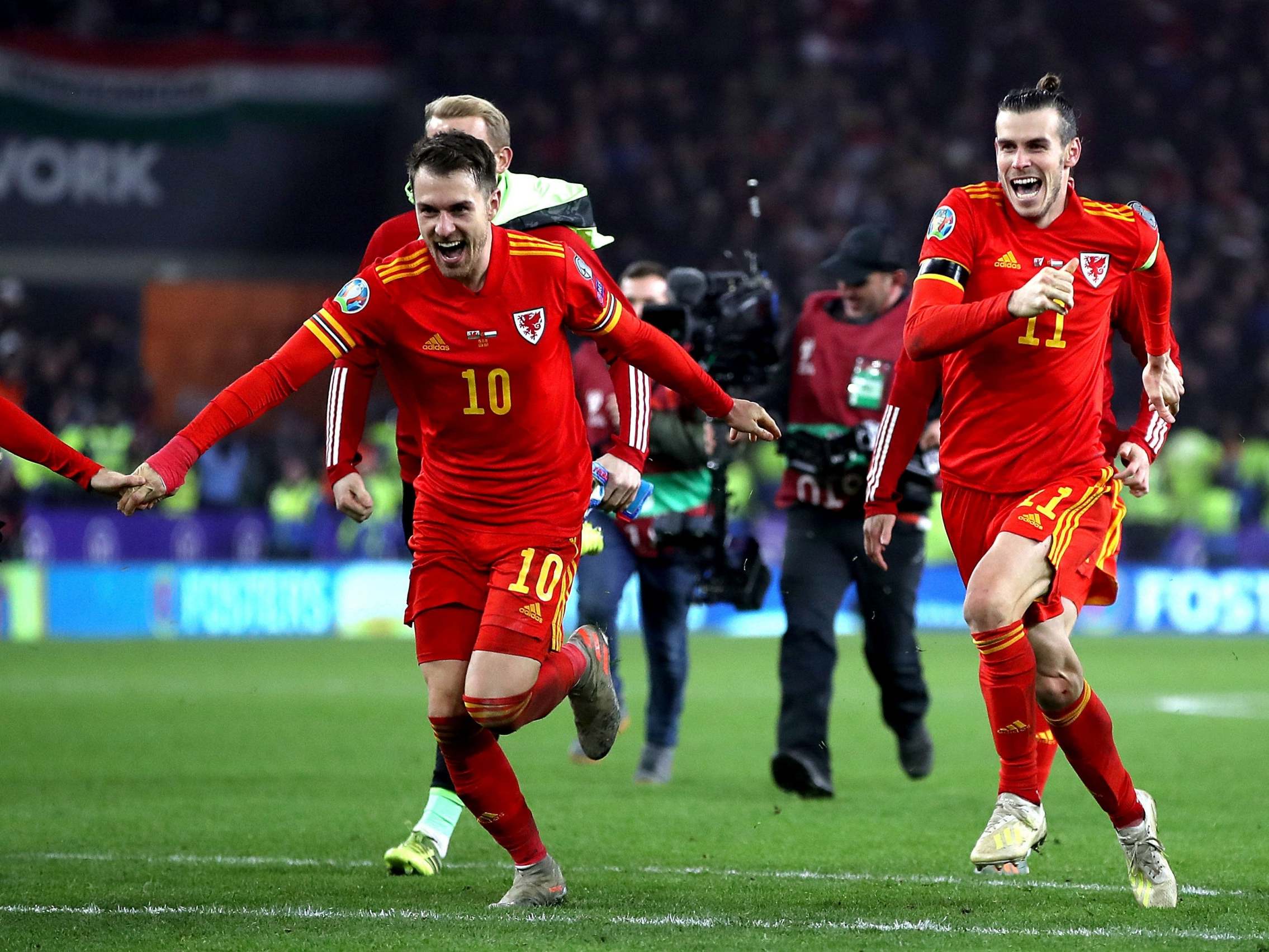 Aaron Ramsey and Gareth Bale celebrate after the full-time whistle