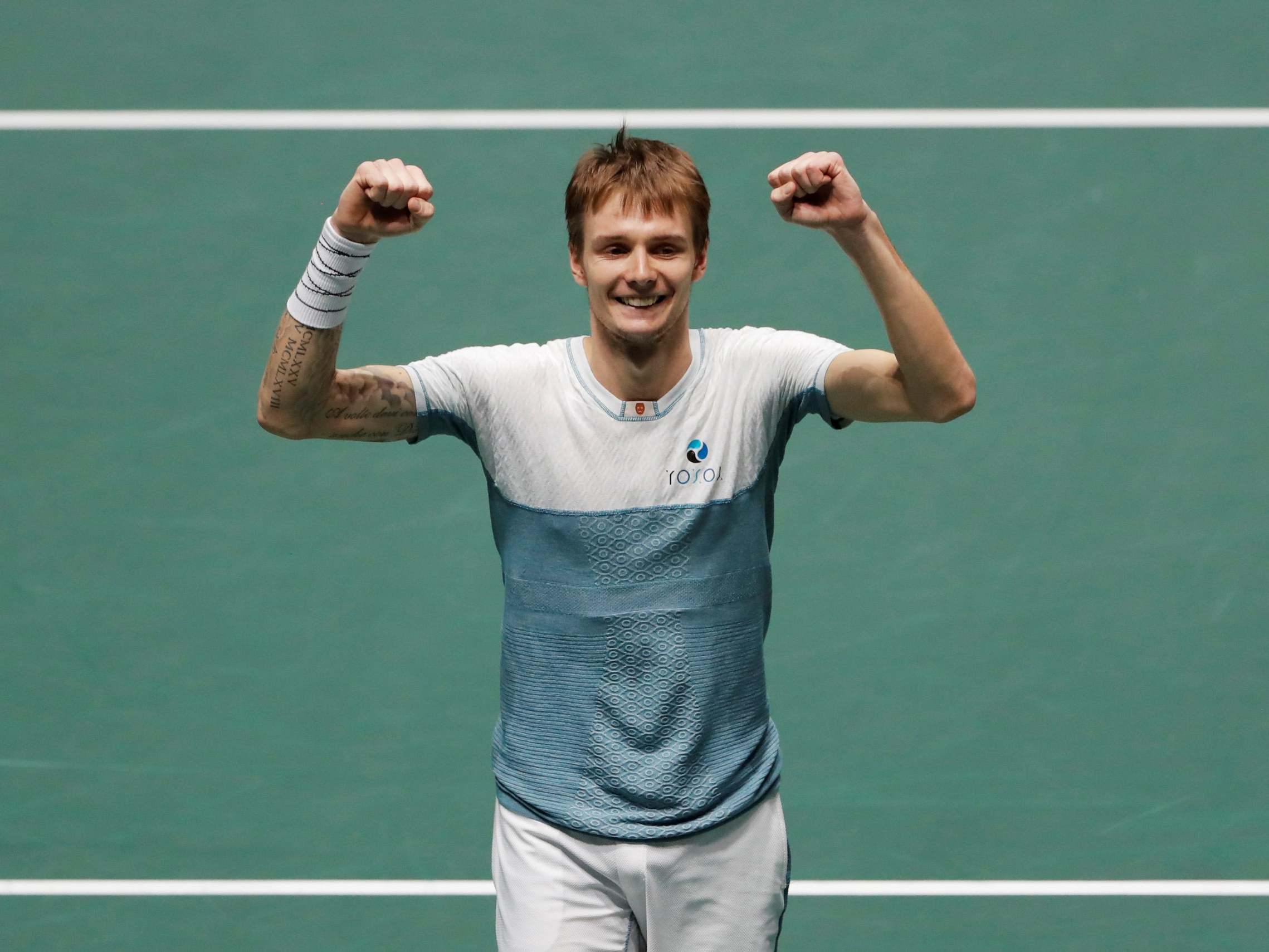 Alexander Bublik celebrates winning his match against Britain's Dan Evans