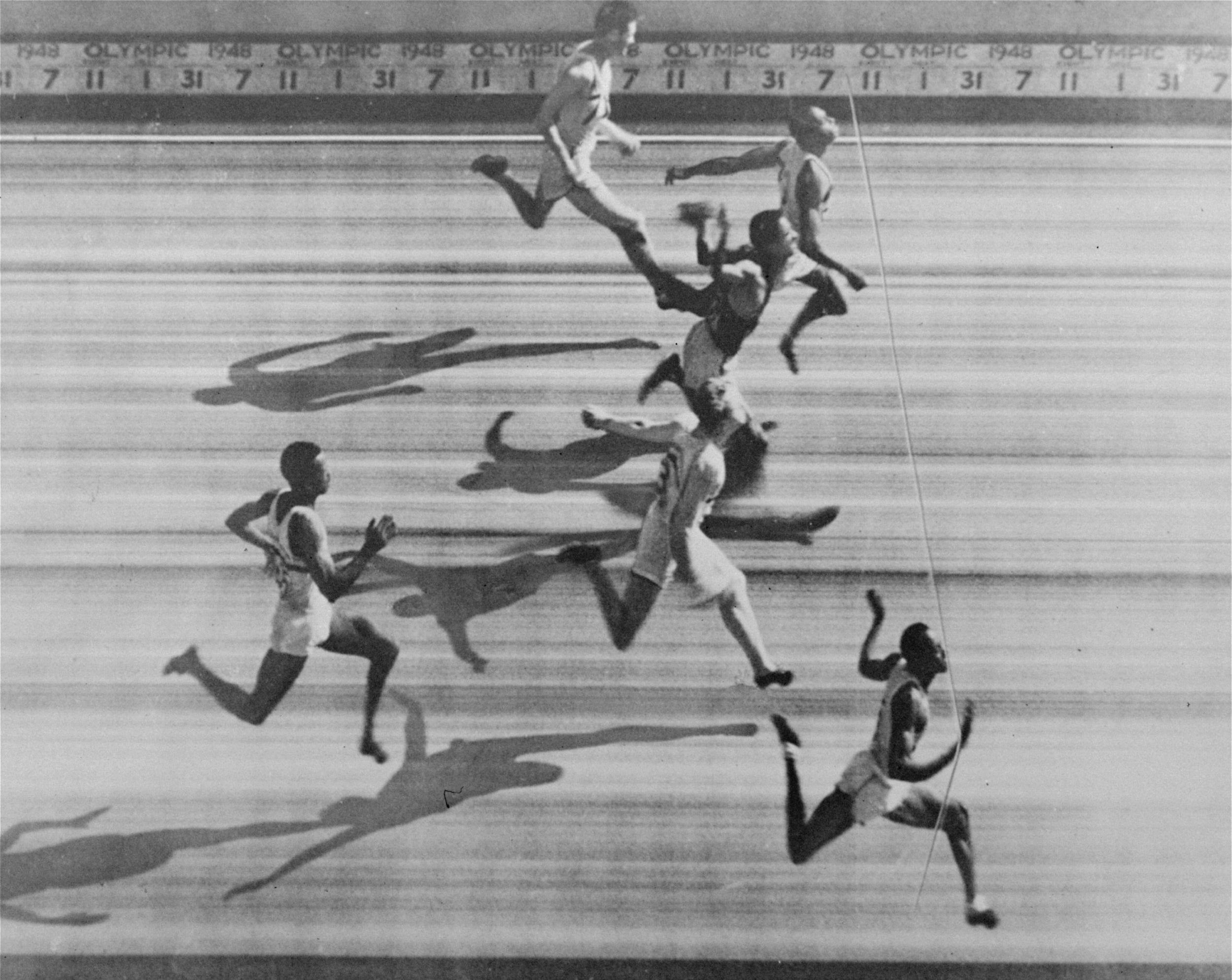 Dillard (bottom of picture) wins the men's 100m at the London Olympics in July 1948