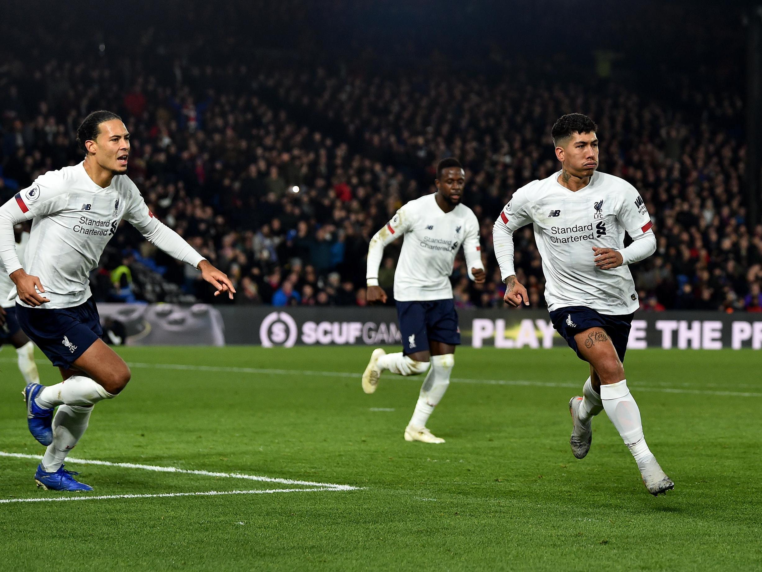 Roberto Firmino celebrates after scoring Liverpool's winner