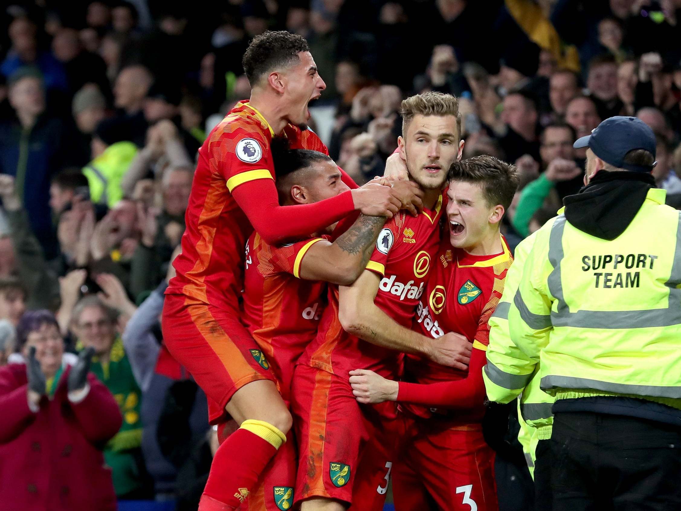 Norwich players celebrate after Dennis Srbeny's goal