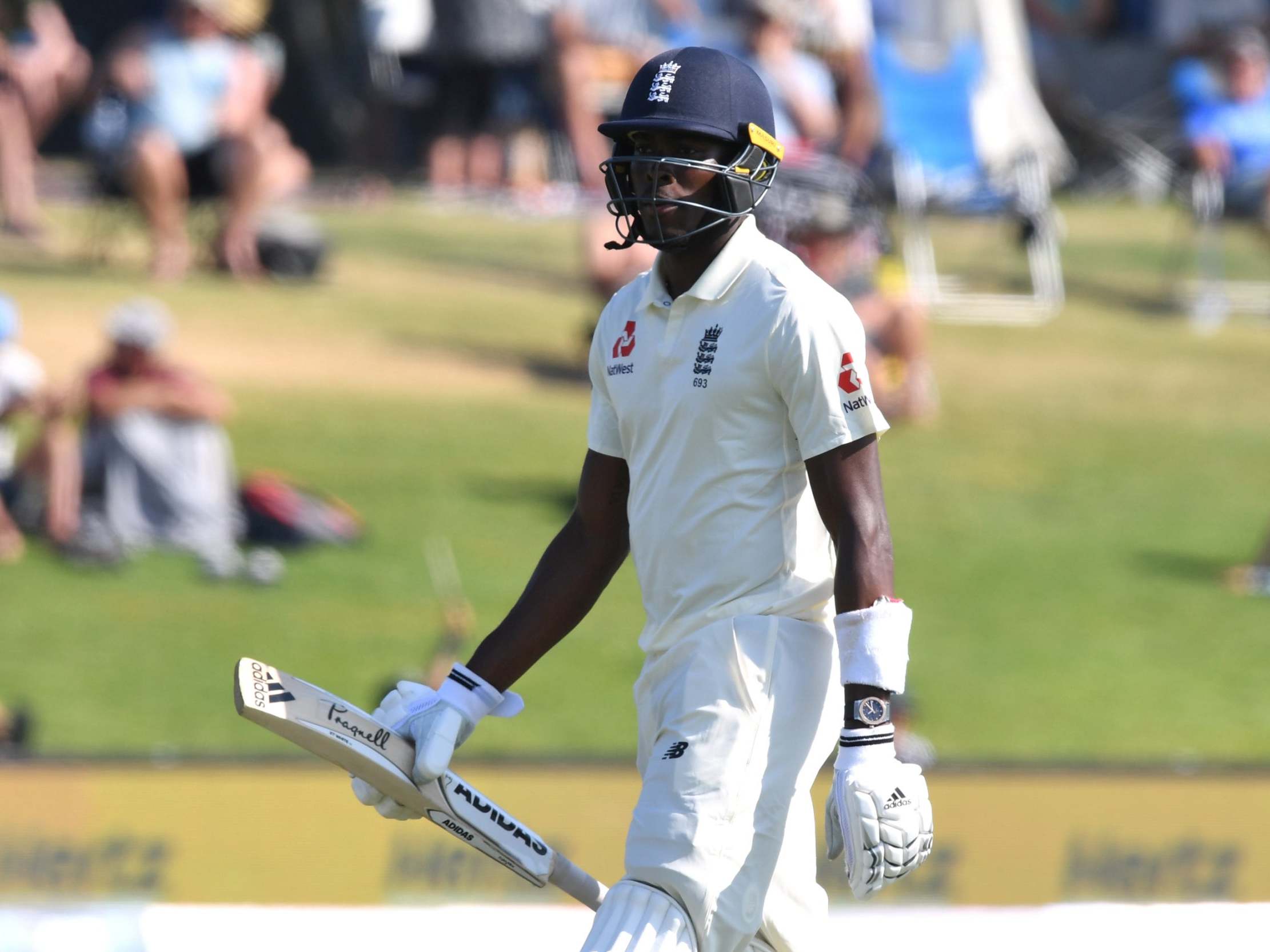 Jofra Archer walks off after being caught at deep backward square-leg