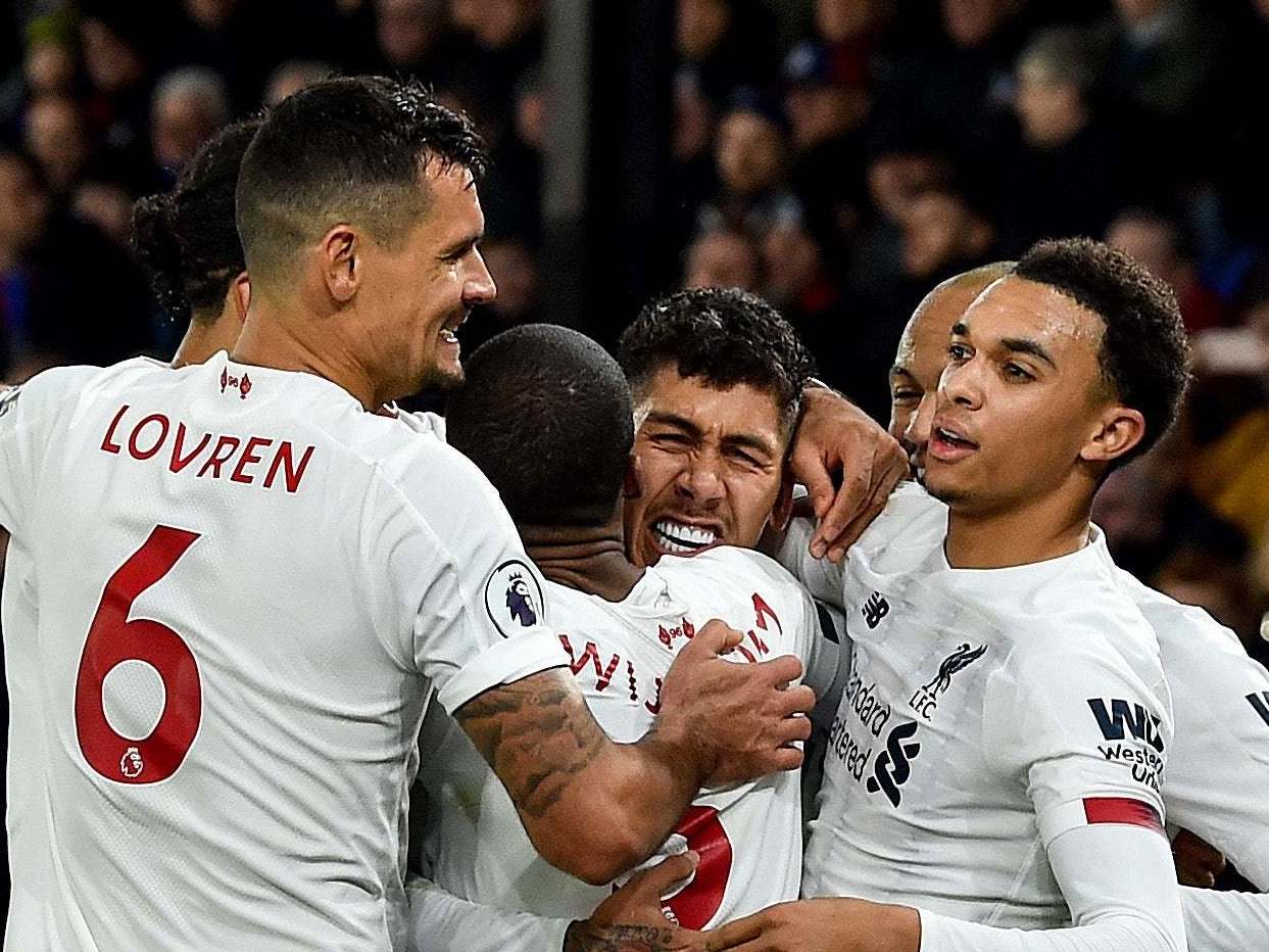 Liverpool celebrate their late winner at Selhurst Park