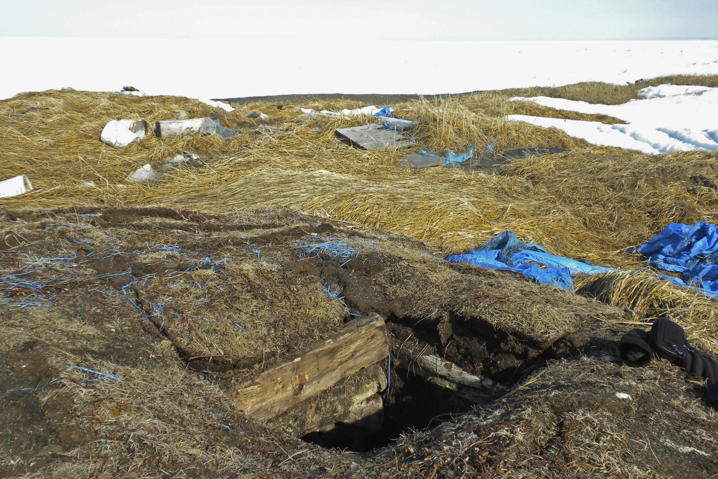 A entrance to a traditional Alaskan ice cellar (Alaska Native Tribal Health Consortium/AP)