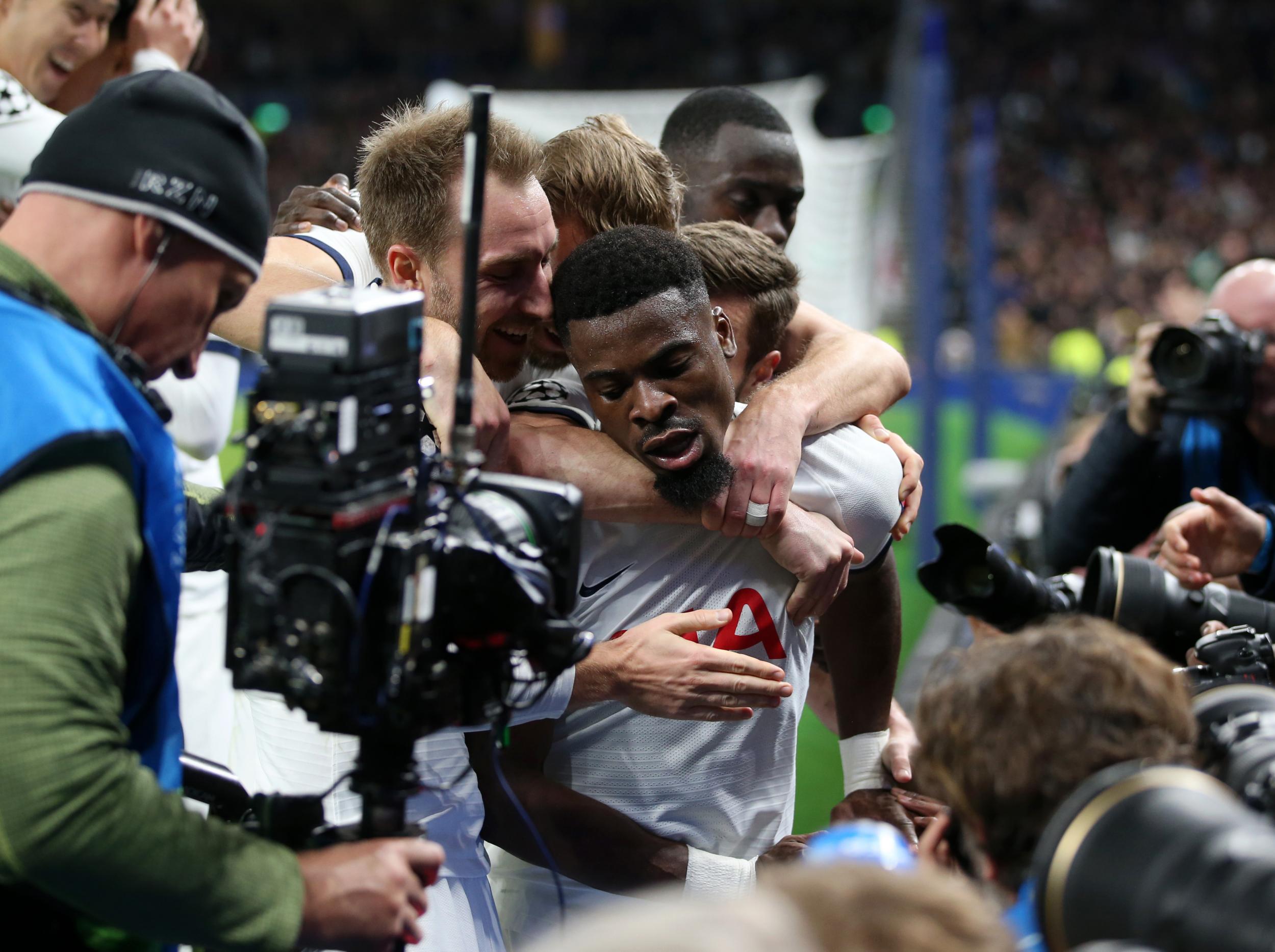 The defender is mobbed after his goal