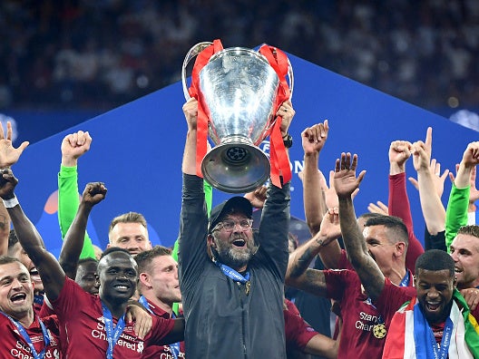 Jurgen Klopp lifts the Champions League trophy