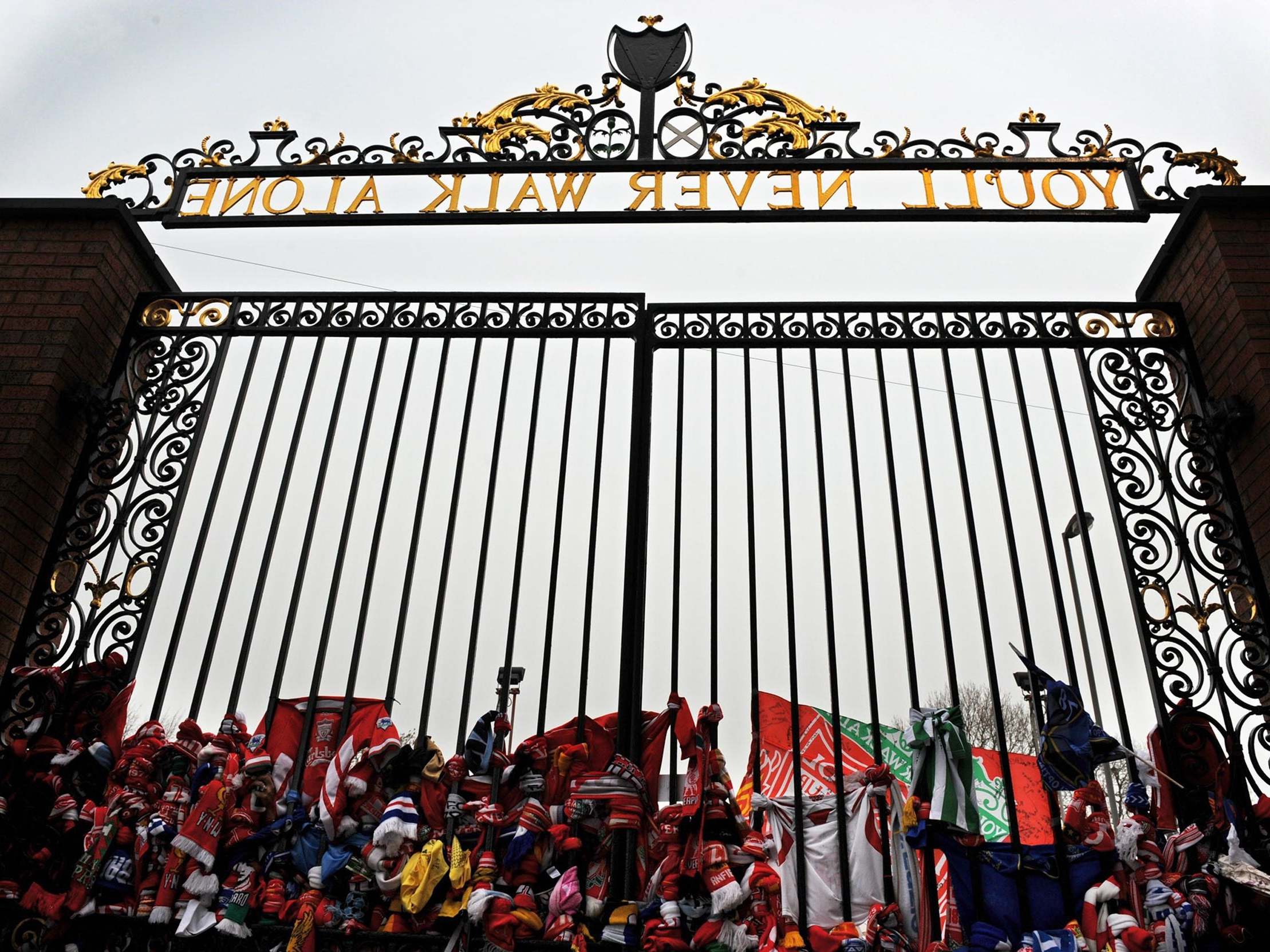 Liverpool scarves tied to the Shankly Gates