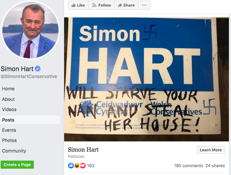 A screengrab of Simon Hart’s 3 November 2019 Facebook post featuring the same sign, now appearing with extra Nazi swastikas