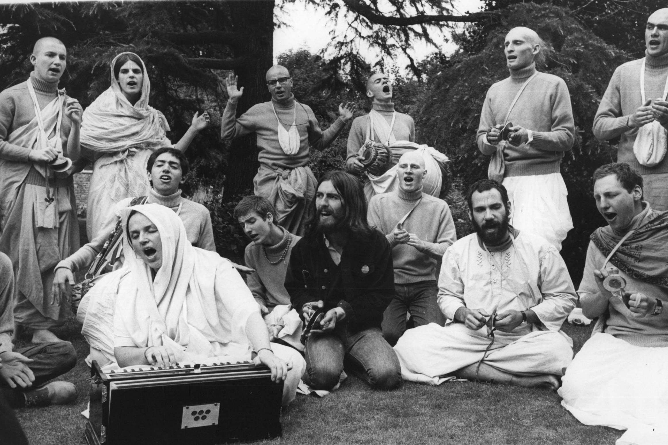 Harrison with members of Krishna Consciousness in London in 1969 chanting the lyrics to the Apple song ‘Hare Krishna’ (Alamy)