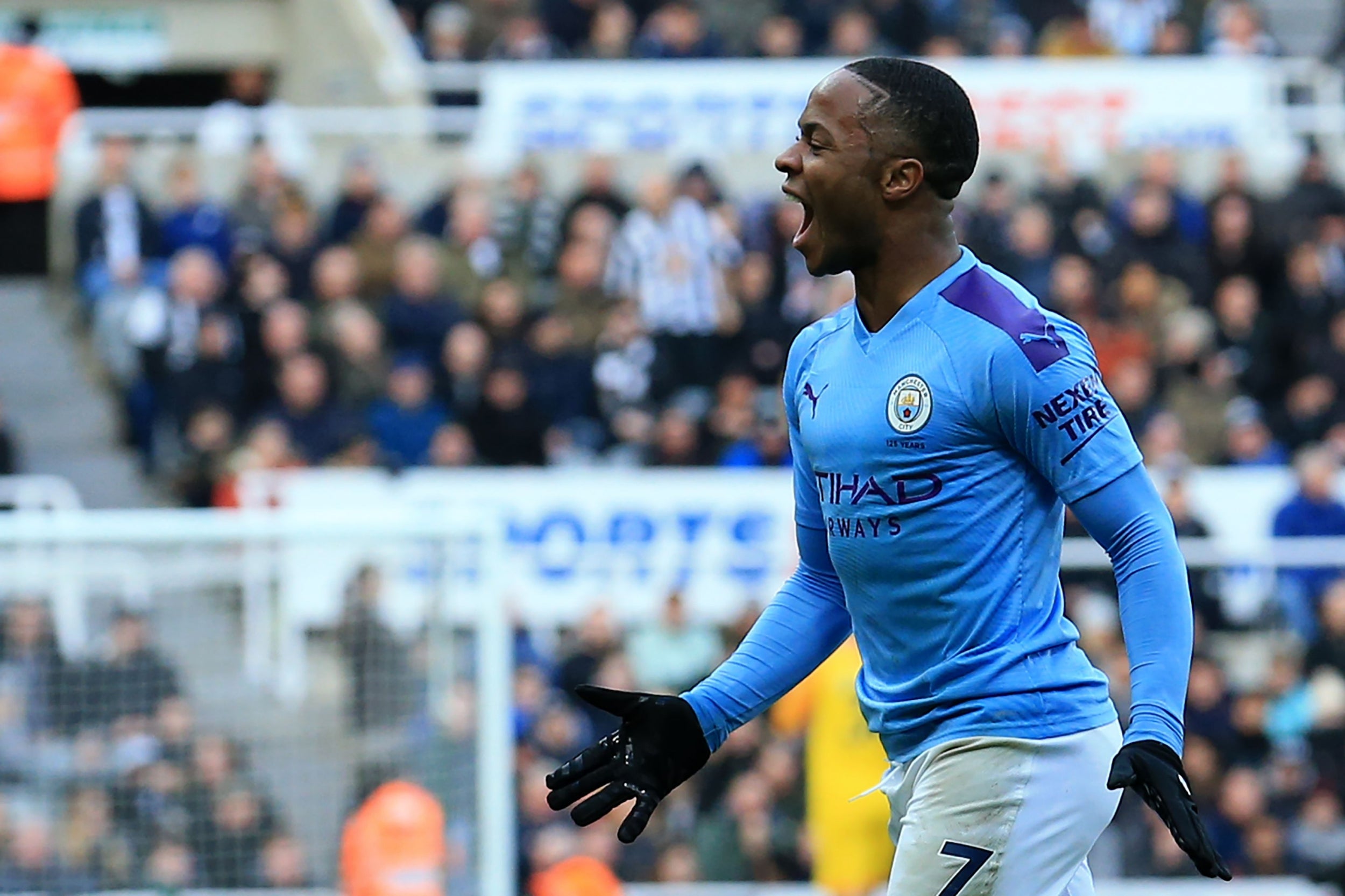 Raheem Sterling celebrates scoring for Manchester City