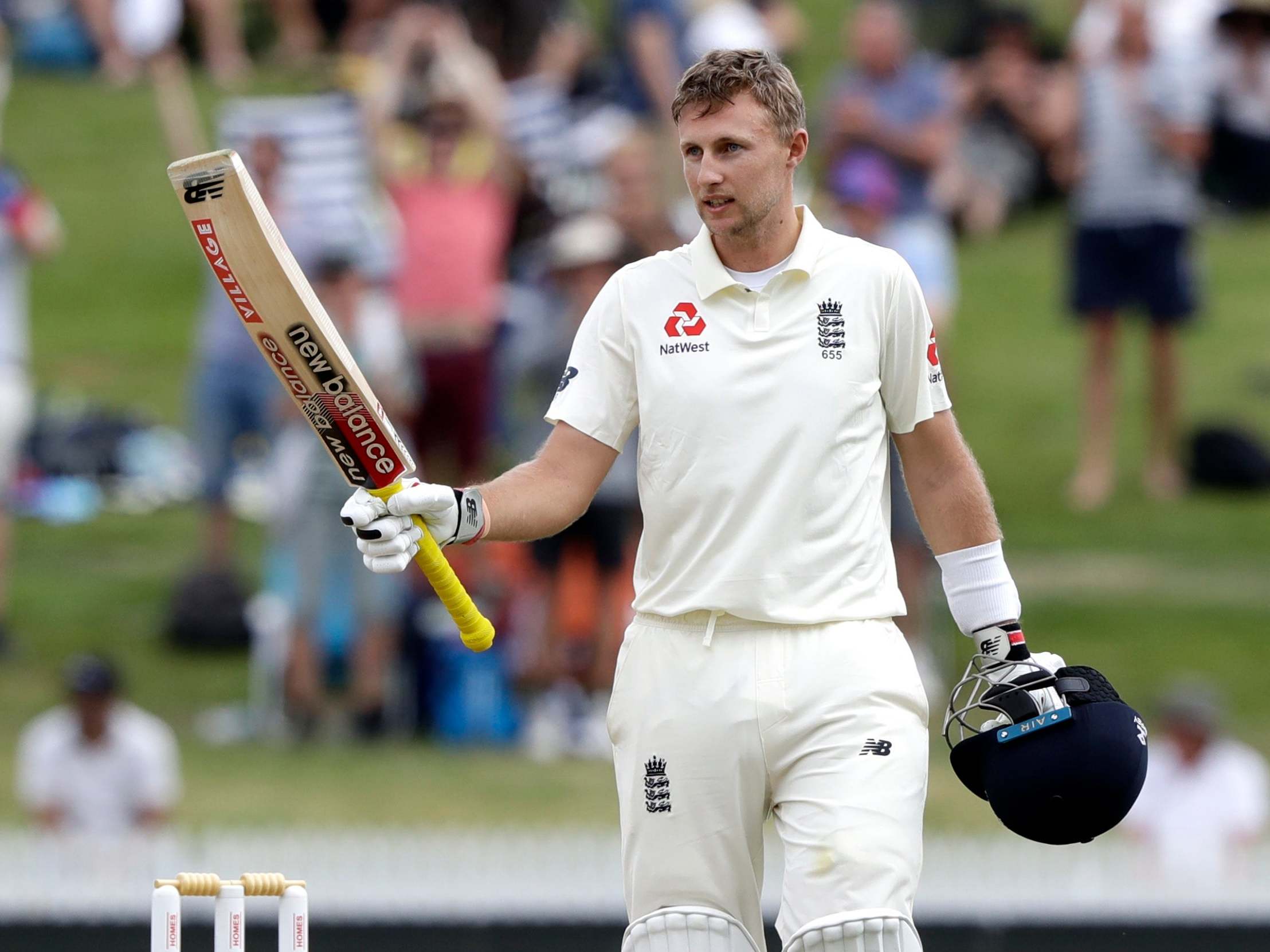 Joe Root celebrates after scoring a century