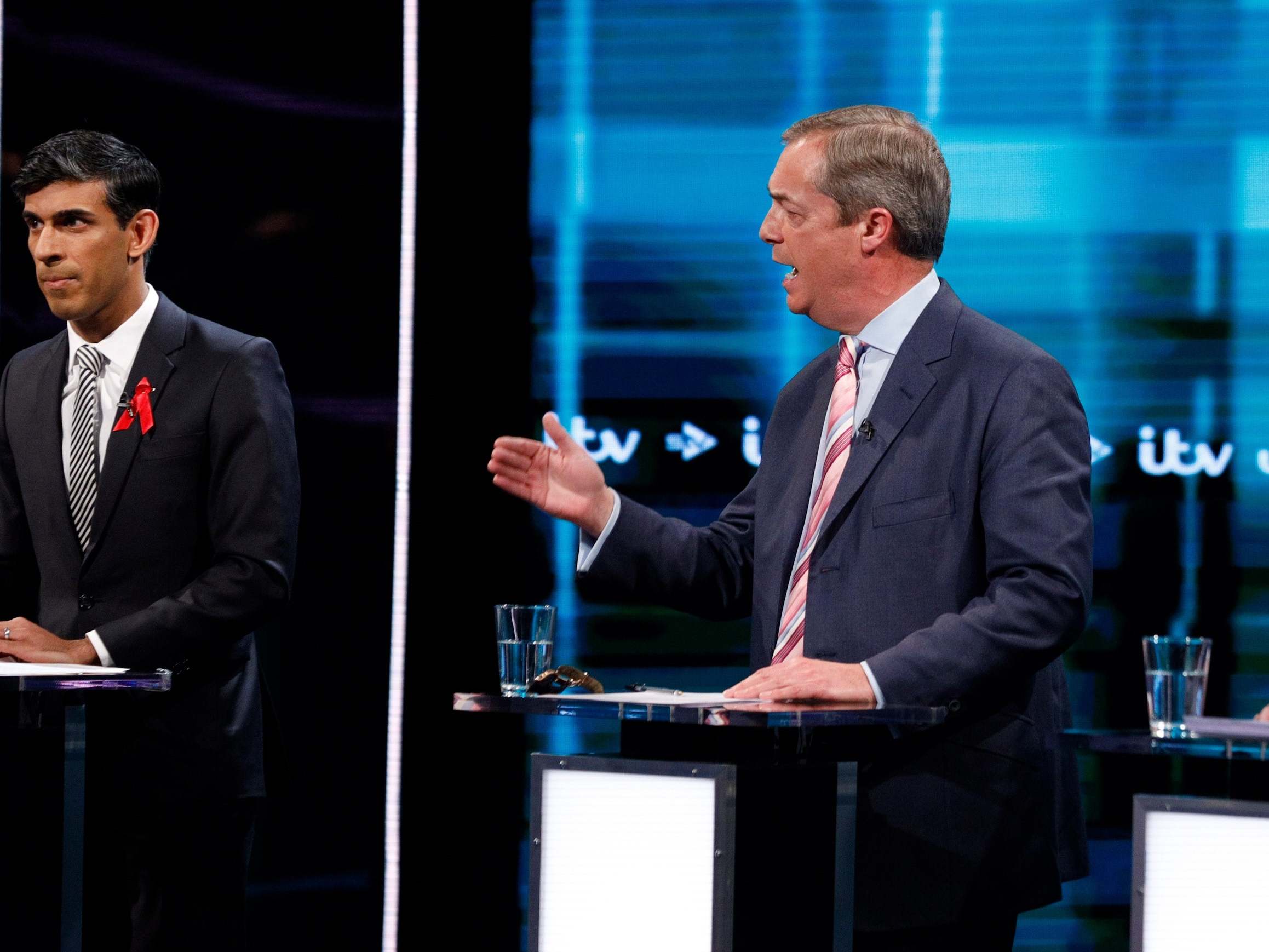 Rishi Sunak and Nigel Farage pictured during a live election debate in 2019