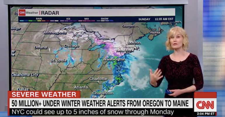 TV weather reports show the snarling storm heading east