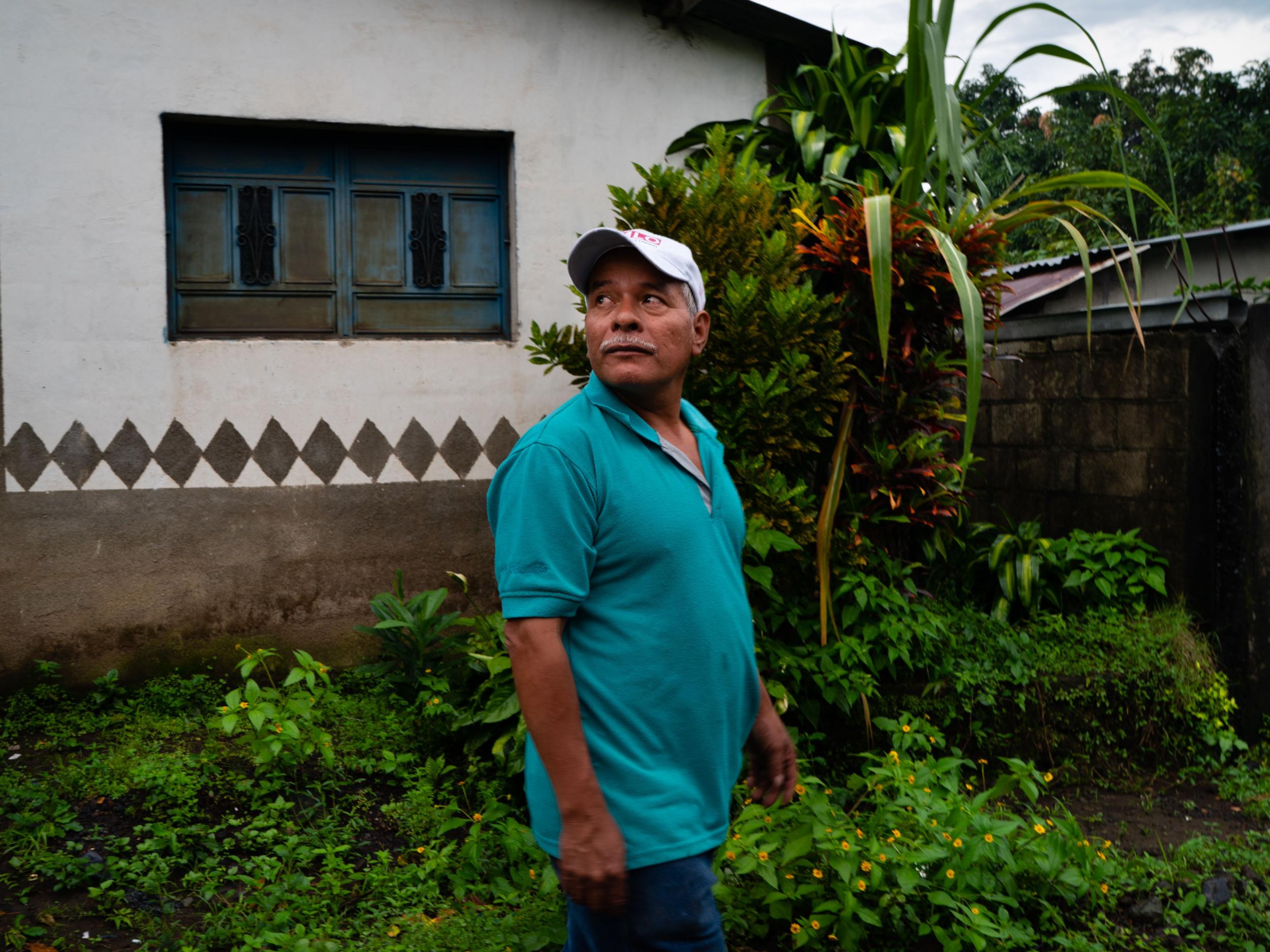 Simeon Camposeco Aguilar looks down the street at the rumbling volcano (The Washington Post)